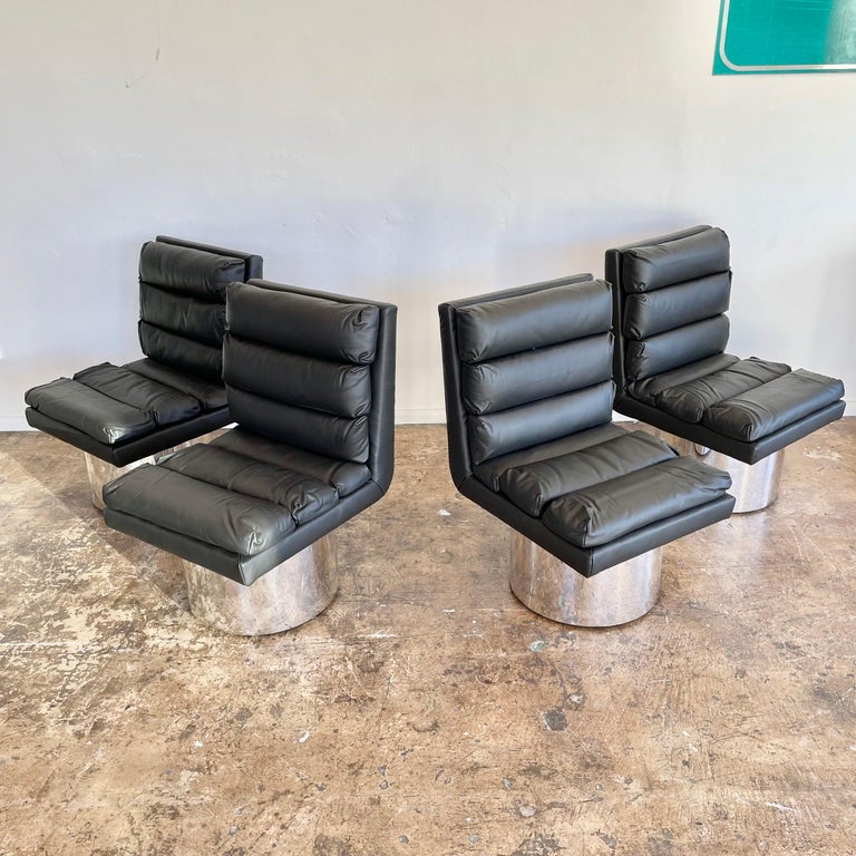Set of four modern leather and chrome dining chairs redone in a thick and supple leather. Chrome base in good condition with some wear as shown. Extremely comfortable. Priced as a set of 4. 
  