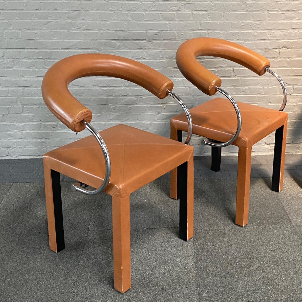 Famous Italian architect Paolo Piva designed these amazing architectural chairs.
It is a set of 4 dining chairs. The name of the chairs is Arcosa.
They were produced by B&B Italia. One of the leading Italian design furniture manufacturer.
The design