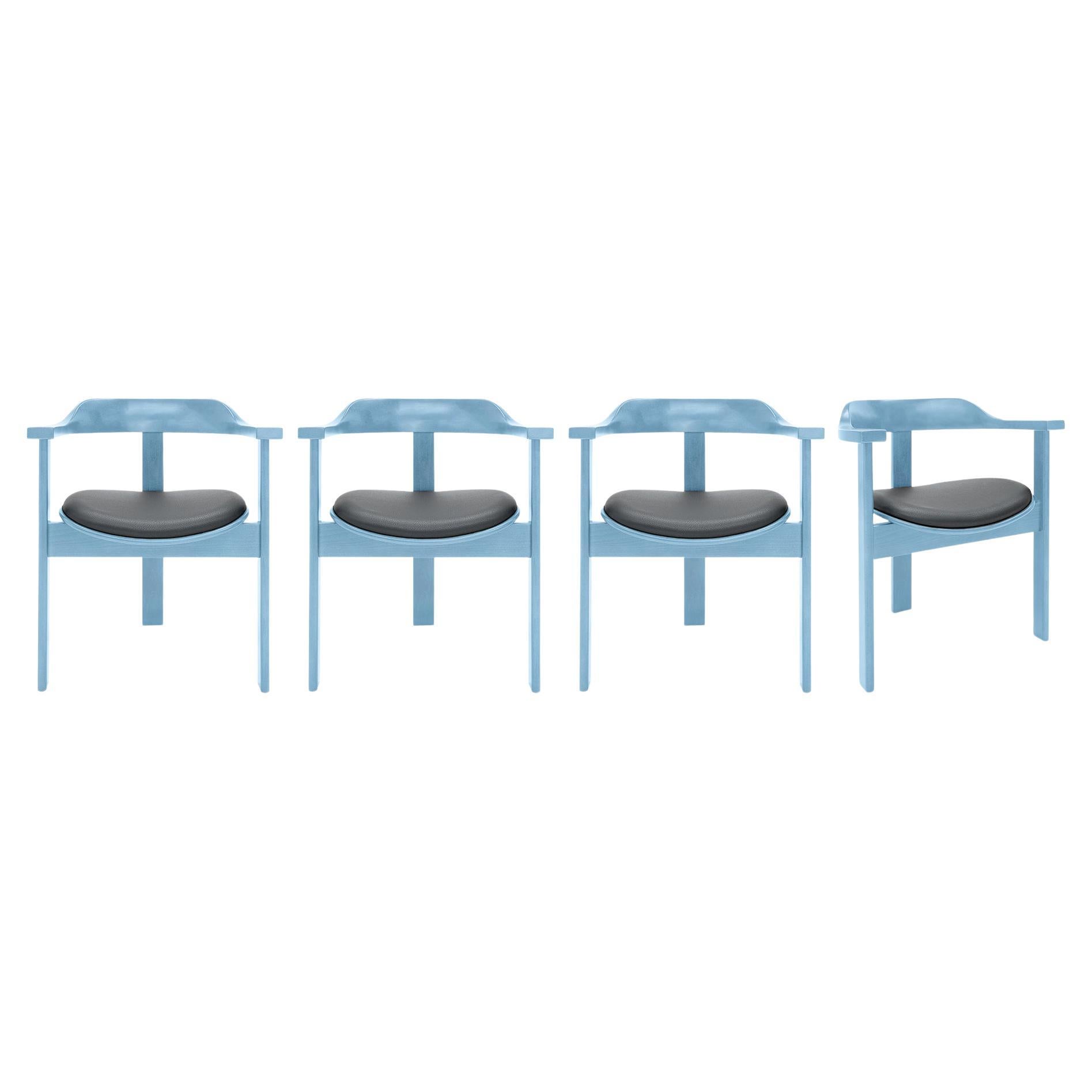 Ensemble de 4 fauteuils Haussmann bleu clair par Robert & Trix Haussmann, Design 1964 en vente