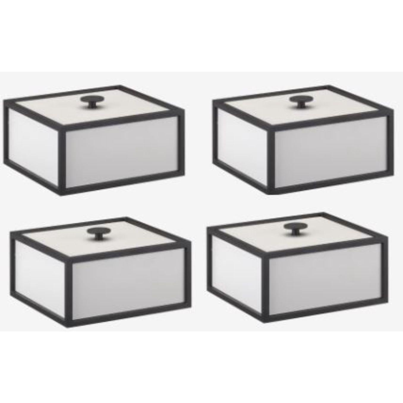 Set of 4 light grey frame 14 box by Lassen
Dimensions: d 10 x w 10 x h 7 cm 
Materials: Finér, Melamin, Melamine, Metal, Veneer
Weight: 1.10 Kg

Frame box is a square box in a cubistic shape. The simple boxes are inspired by the Kubus