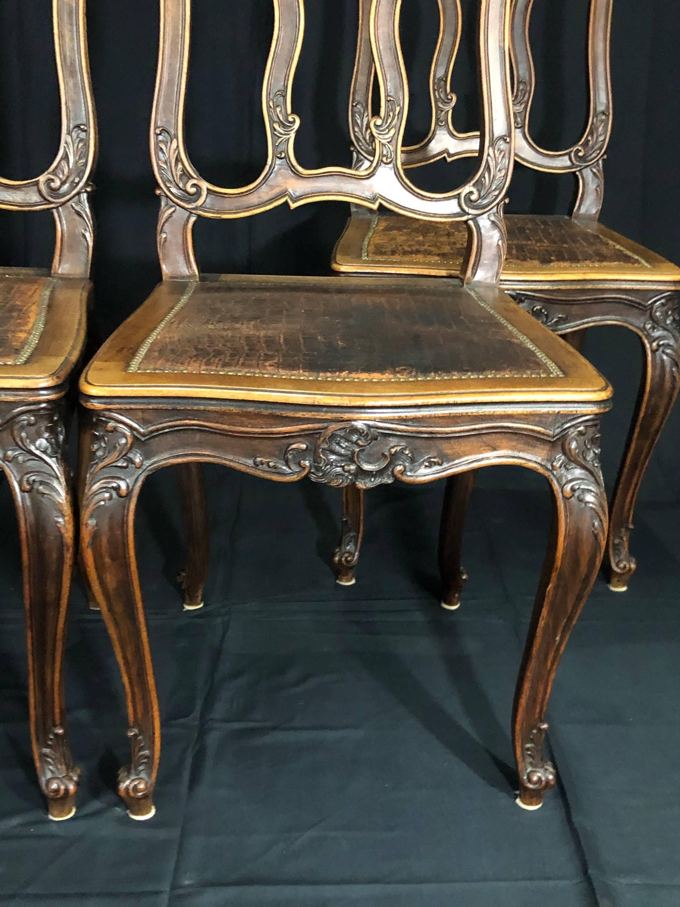 French Set of 4 Louis XV Style Pressed Leather and Carved Wood Dining Chairs For Sale