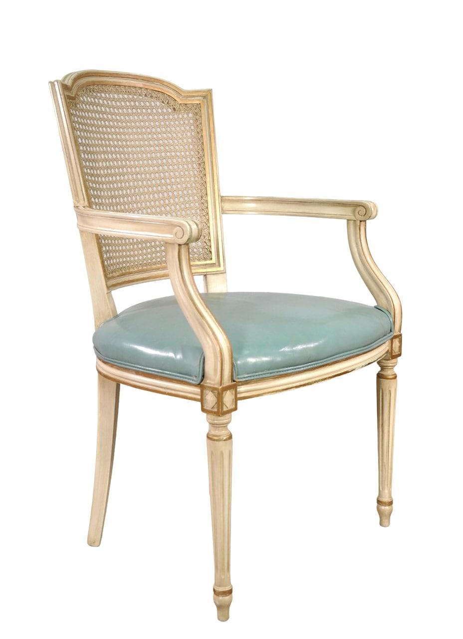 Set of 4 French Louis XVI Style Painted and Gilt Dining Chairs with Rattan Backs, the perfect choice for timeless Neoclassical styling with fine dining comfort! The shield shaped seatbacks are caned for light weight and ideal for warm climates. The