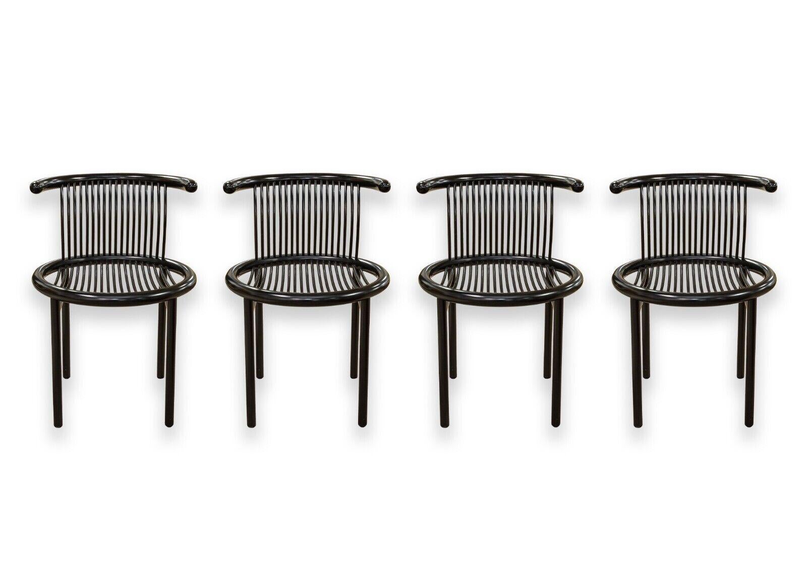 A wonderous post modern dinette set featuring a set of four Lubke chairs and a round Peterson Design dinette table. The set of four chairs are designed by award winning Herbert Ohl for Lubke. This model is titled the 