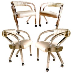Set of 4 Lucite Chairs on Casters