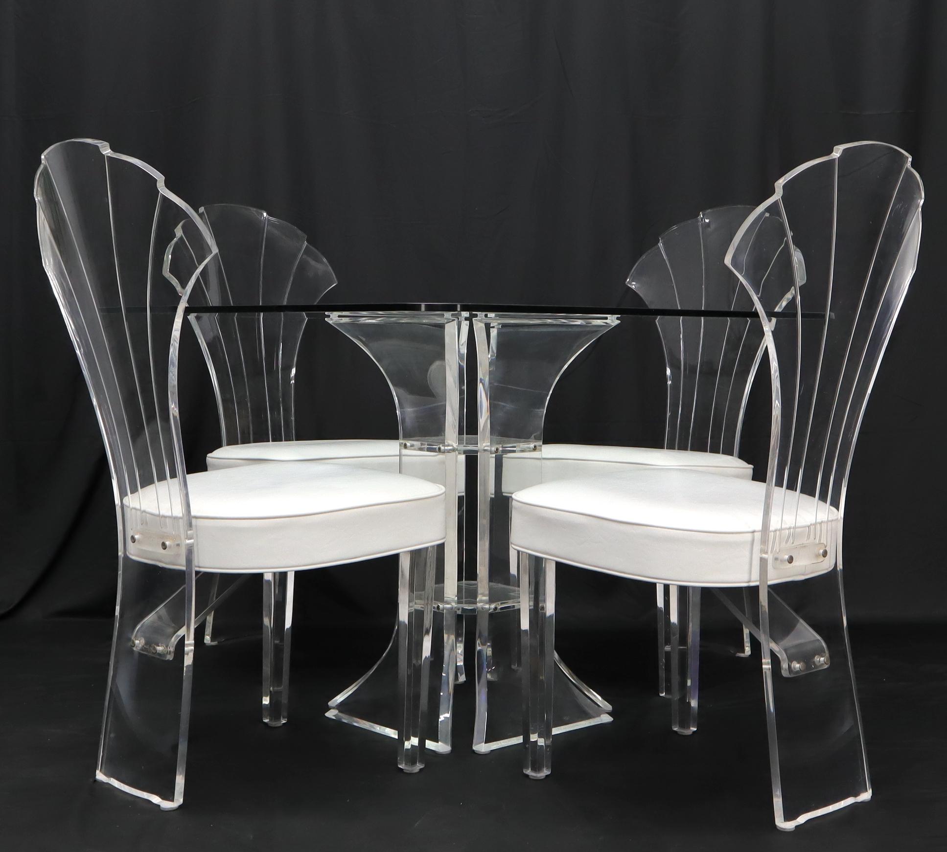 Mid-Century Modern scallop shape back set of four chairs and matching dining table set. Chair dimensions: 19 x 18 x 39 x 17.5.