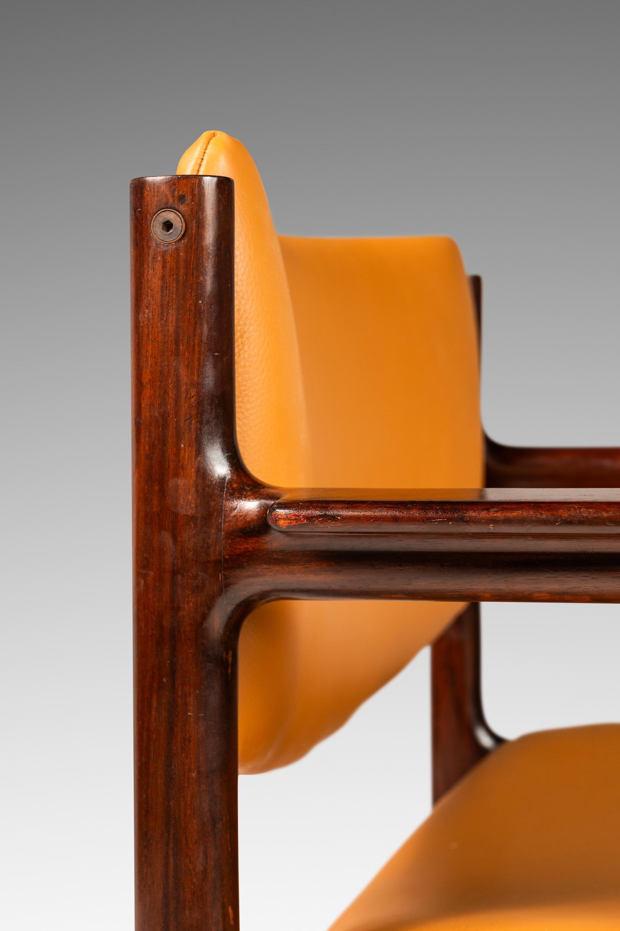Set of 4 Mahogany Arm Chairs, Caramel Leather by Danish Overseas Imports, 1960's For Sale 1