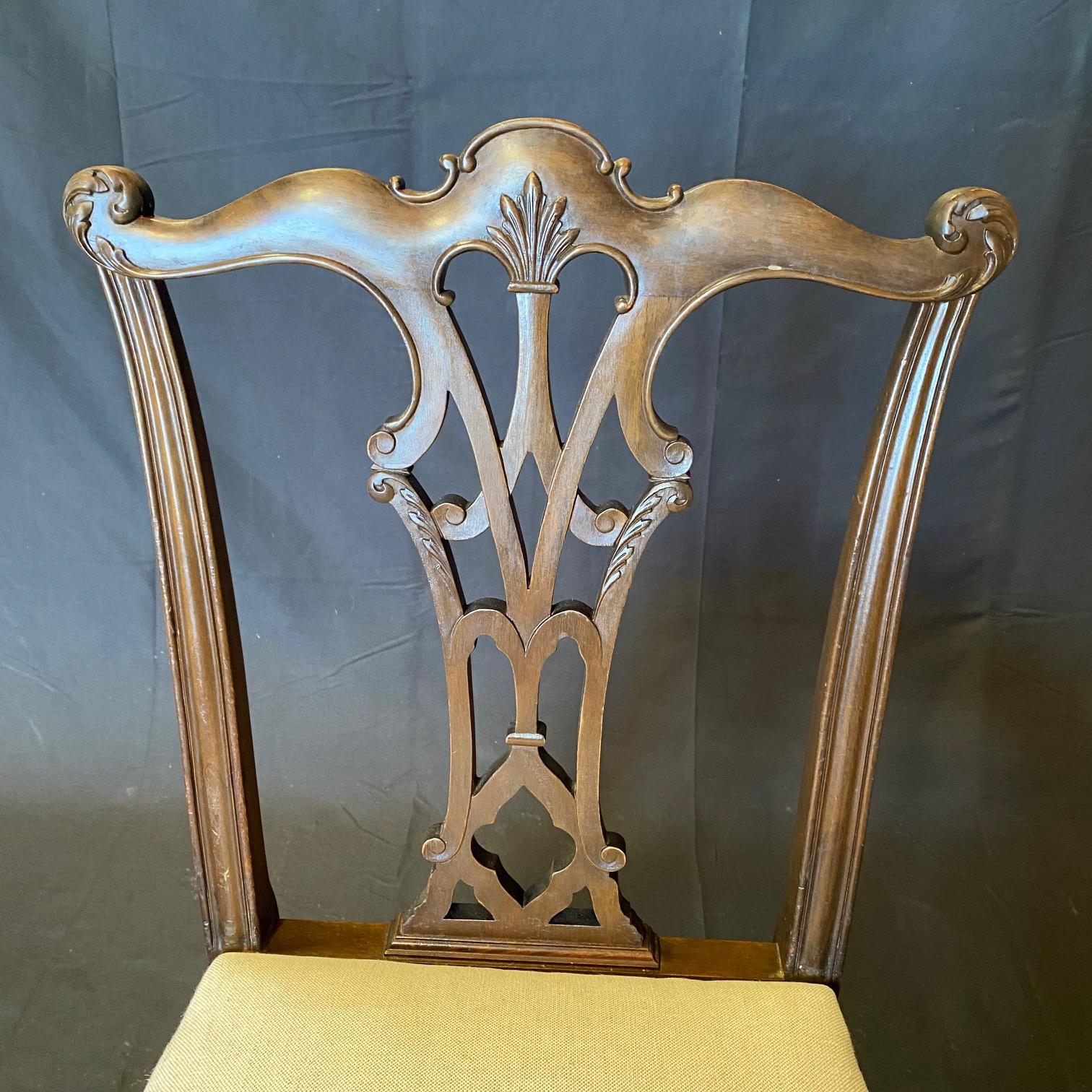 A gorgeous set of four Chippendale style dining chairs midcentury solid mahogany frames, with new neutral high end fabric upholstered seats. Claremont from Grand Rapids Chair company.  #6236


H seat 18.5” 