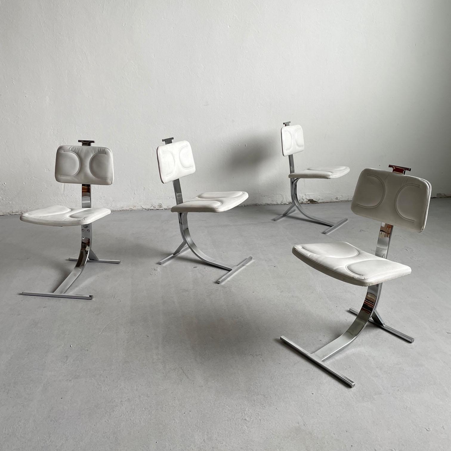 Set of 4 stunning sculptural dining chairs from the 1970s

The chairs feature a very solid frame with a cantilever curved form made of galvanized steel. The seats and the backrests are upholstered in a high quality soft white leatherette that has