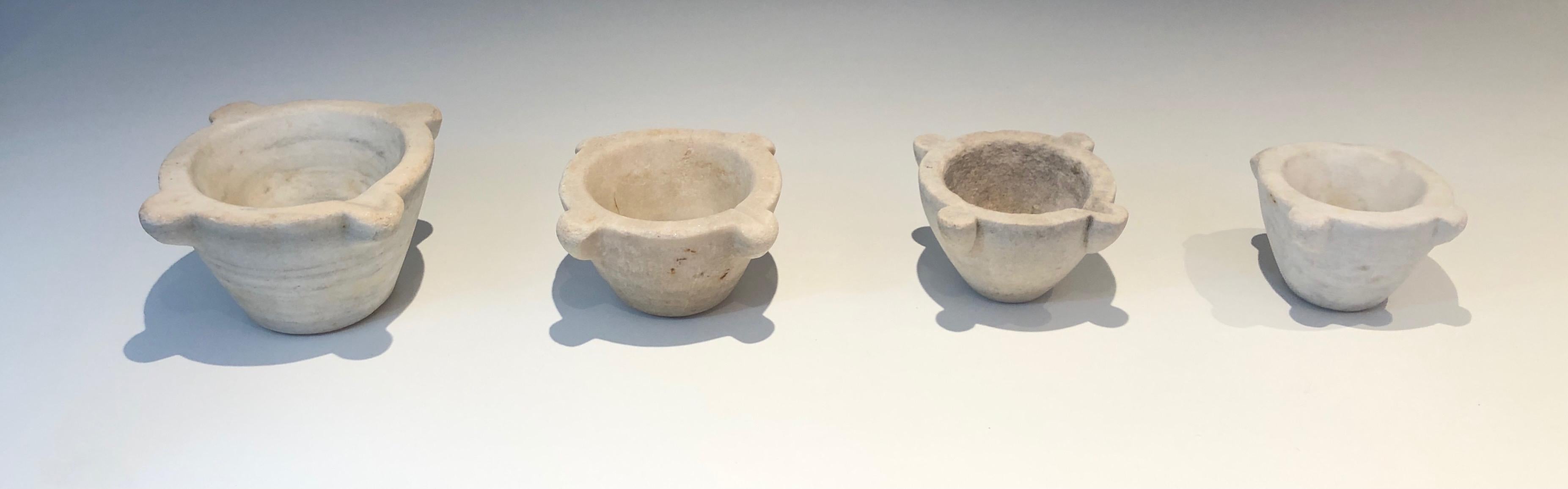 These very nice 4 mortars are made of white marble. This is a French work, 18th century.