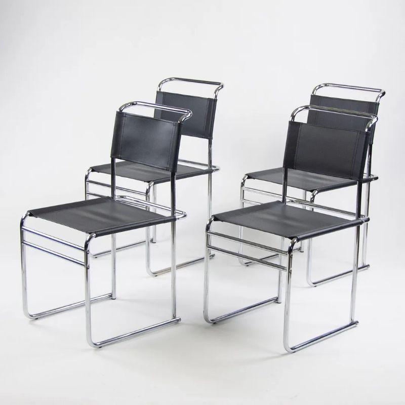 Listed for sale is a set of four gorgeous B5 dining chairs, designed by Marcel Breuer. These vintage examples are in fabulous condition with black upholstery. These are iconic Breuer pieces and are very hard to come by. 

The price listed includes