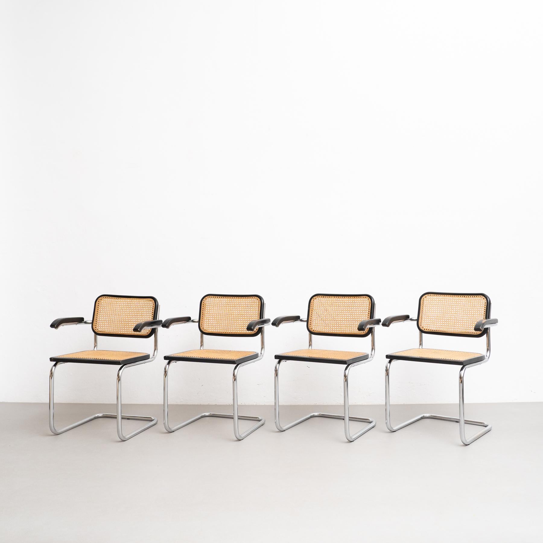 Set of 4 Cesca chairs, designed by Marcel Breuer.

Manufactured in Italy, circa 1960 by Unknown manufacturer.

Metal pipe frame, wood seat and back structure and rattan.

In good original condition, with minor wear consistent with age and use,