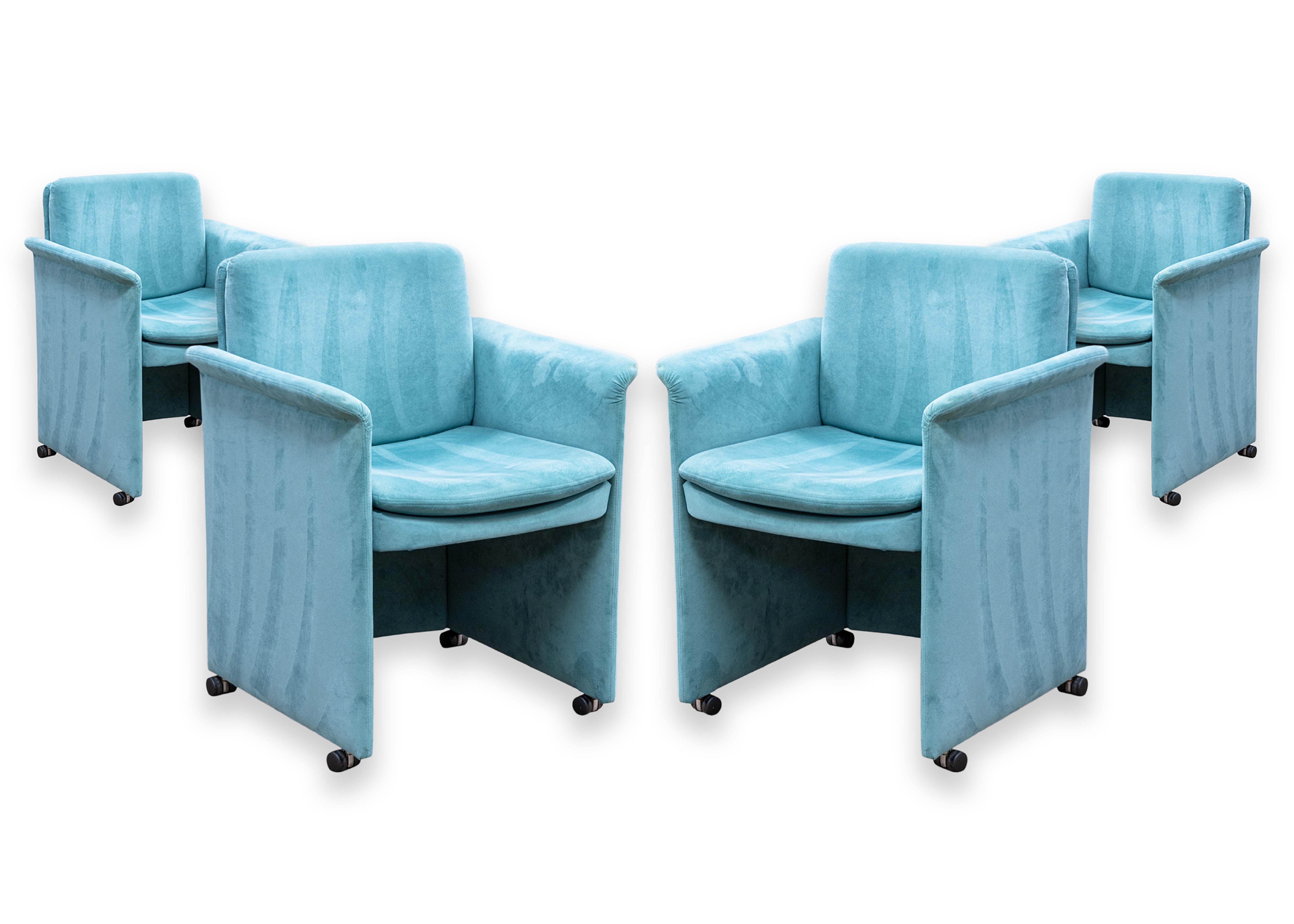 A set of 4 Mario Bellini for Cassina style armchairs. This is a very pretty set of contemporary modern armchairs. These chairs are in the style of the 401 Break chair by Bellini for Cassina. These chairs feature a very bright blue velvet tufted