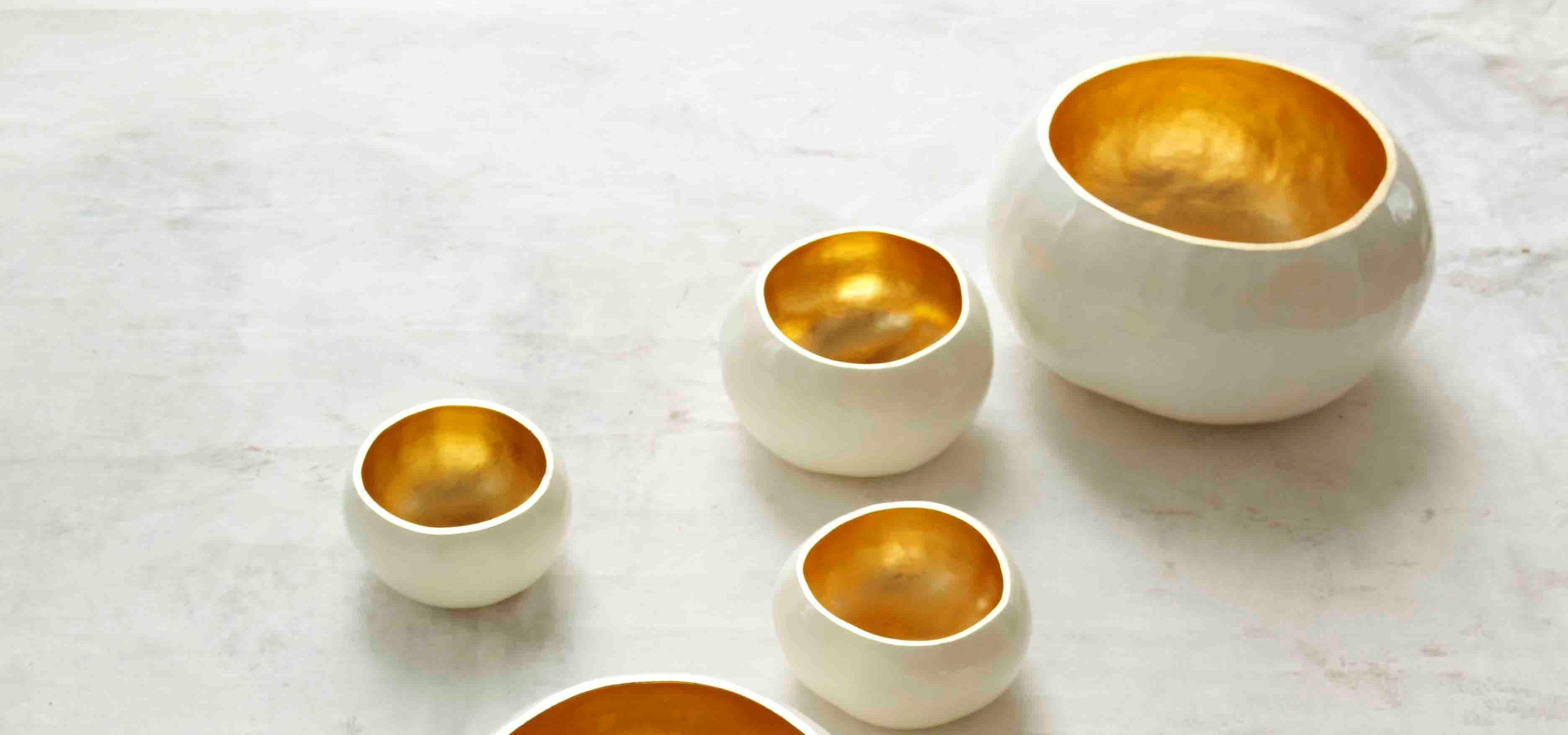 Set of 4 Mathias bowls by Onora
Dimensions:
 D 22 -25 cm
 D 18 - 21 cm
 D 16 - 17 cm
Materials: Lacquered wood, Gold Leaf
Also sold separately. Please contact us.

These gourds are grown, dried, carved, cleaned, and then covered with several