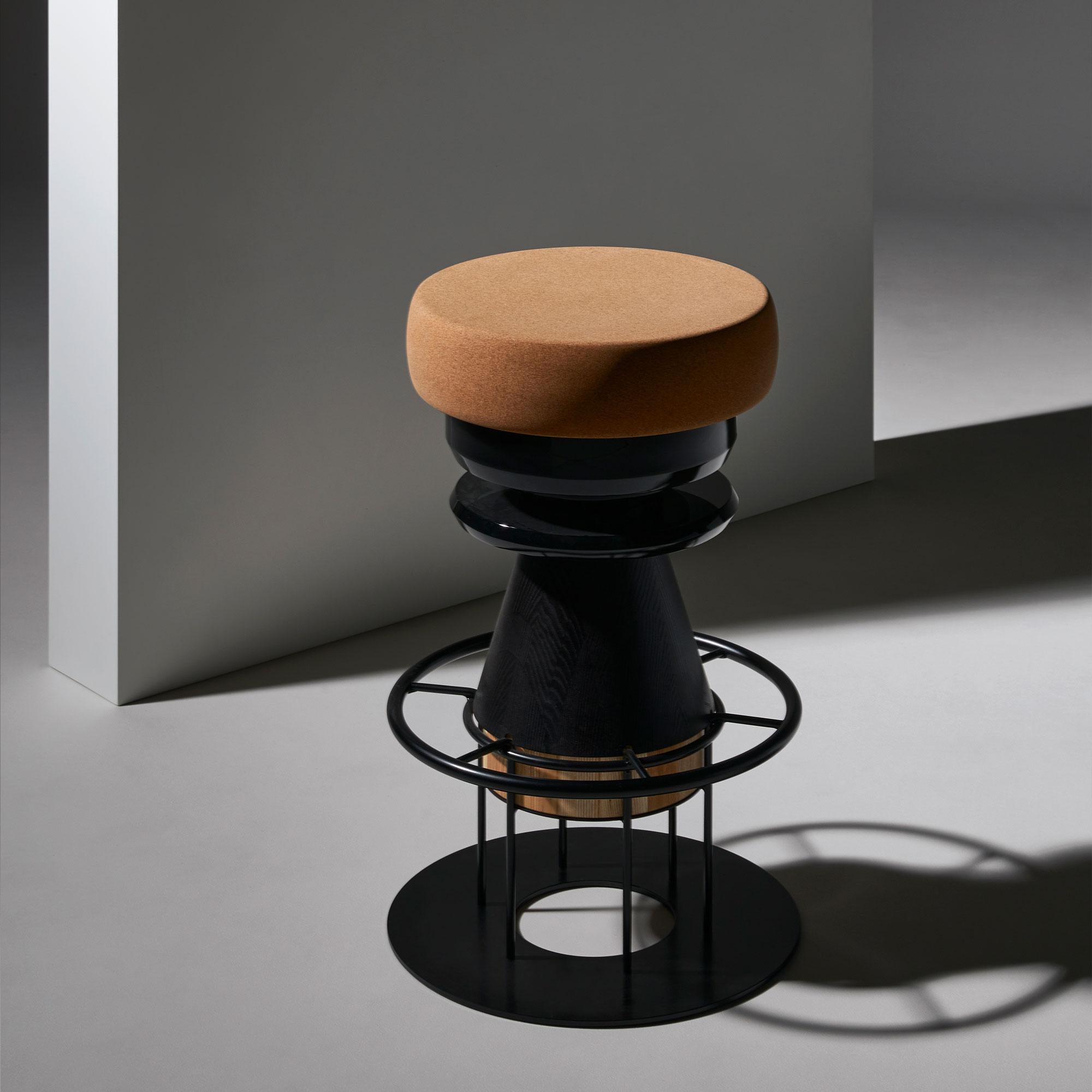 Set of 4 Medium black tembo stool, note design studio
Dimensions: D 36 x H 64 cm
Materials: Lacquered steel structure, solid wood (beech) and lacquered MDF, natural cork base.
Available in colorful version and in 3 sizes: H 46, H 64, H 76