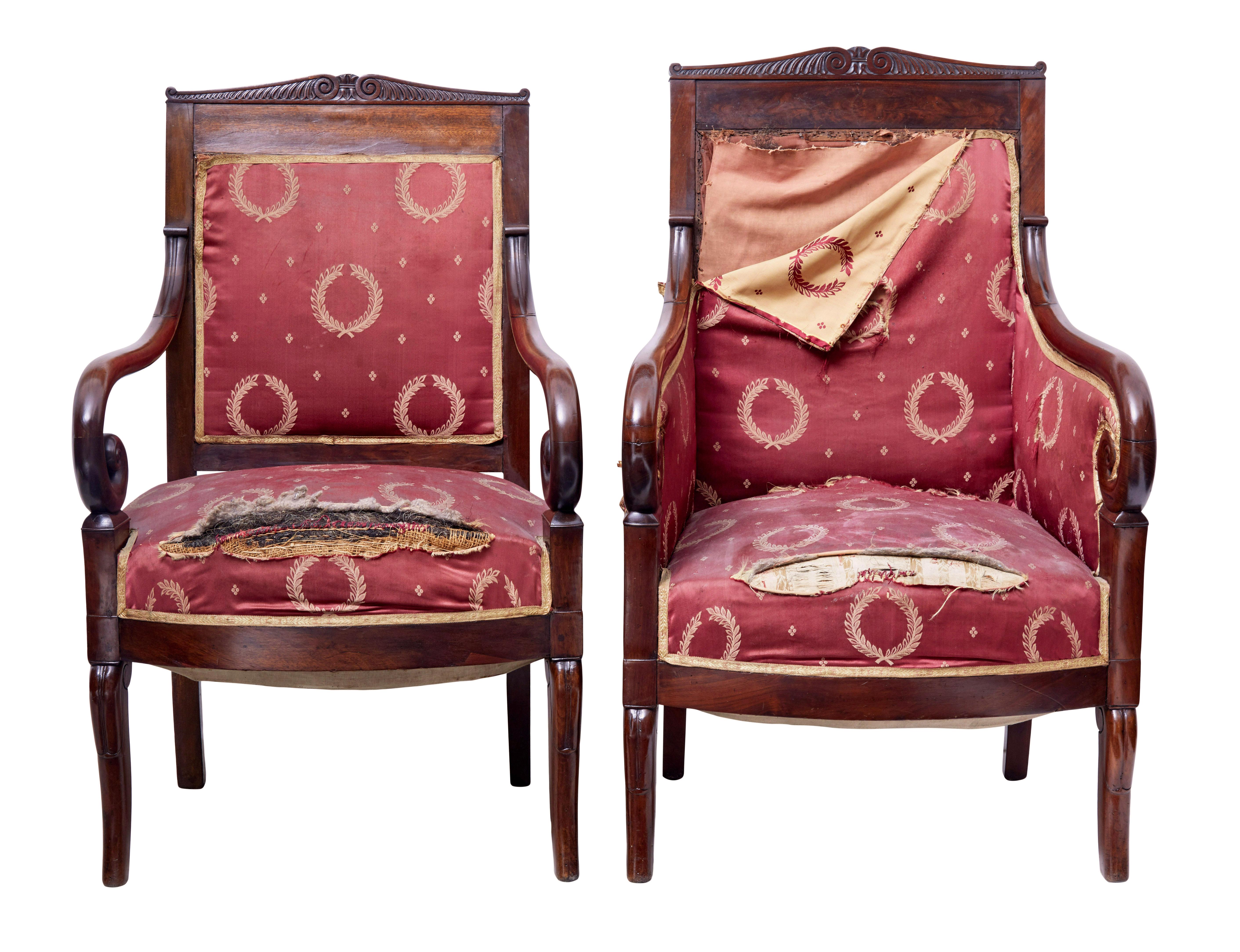 Beautiful set of 4 Danish empire armchairs circa 1860.

Comprising of 2 armchairs and 2 open frame armchairs.  Main feature being the scrolling arm and scrolling front leg.  Carved back rail with padded back rest insert and overstuffed