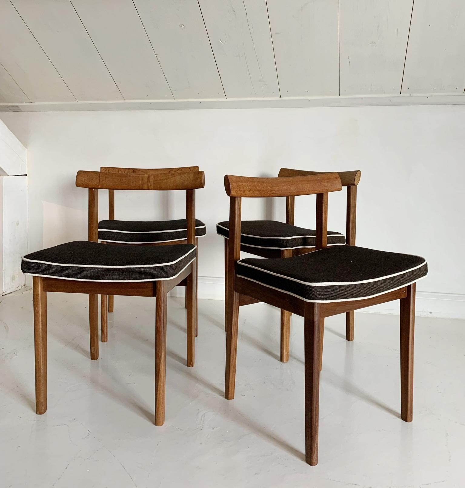Great set of midcentury chairs. Combining traditional craftmanship and natural materials with a modern design. Beautiful proportions and good practicality.