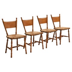 Set of 4 Mid Century Chairs in Solid Oak and Straw 1950s