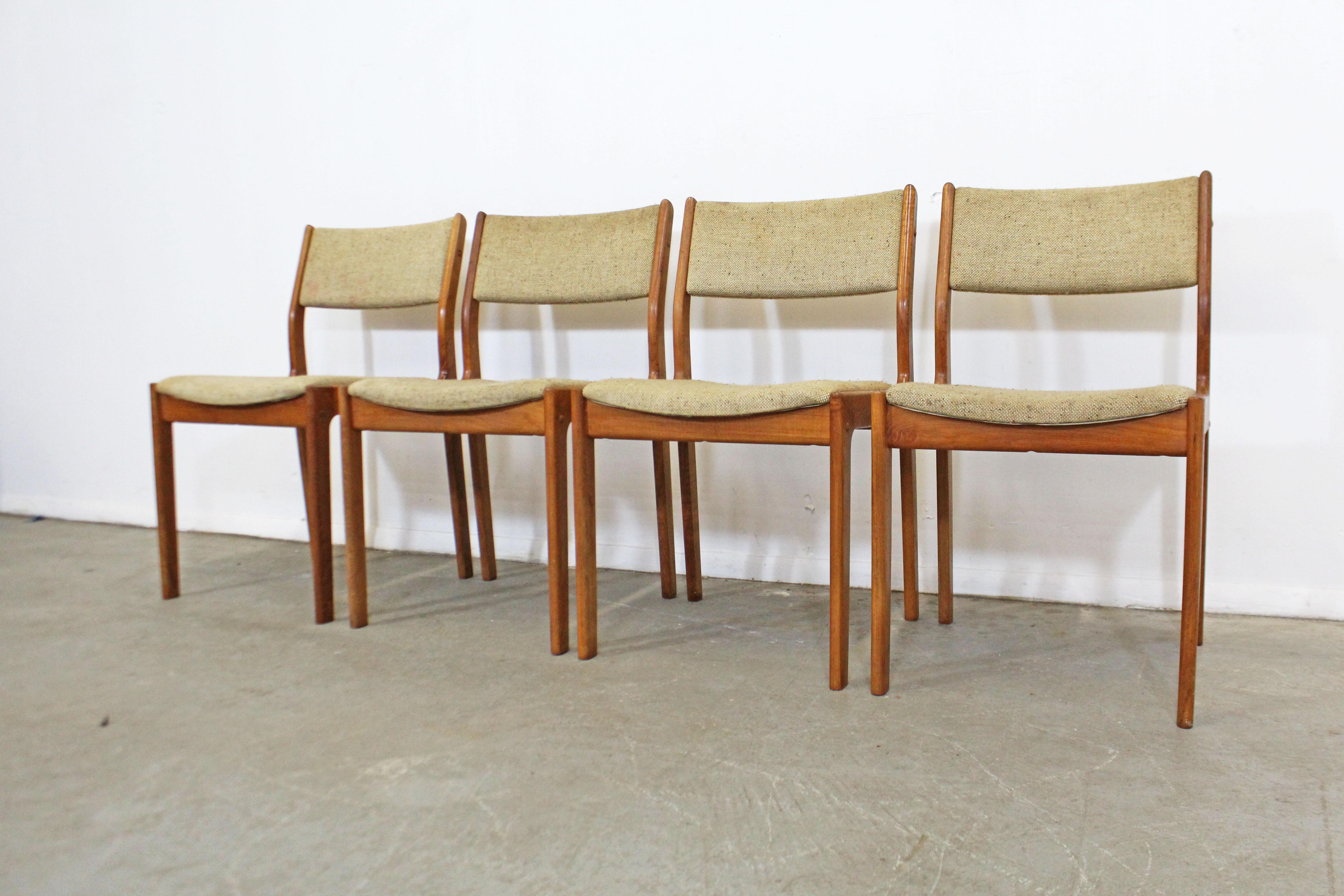 What a find. Offered is a set of 4 Danish Modern teak dining chairs made by D-Scan. These chairs need restoration, but have great potential. Show some surface wear on wood, stains on upholstery, and are slightly loose. They are marked by D-Scan.