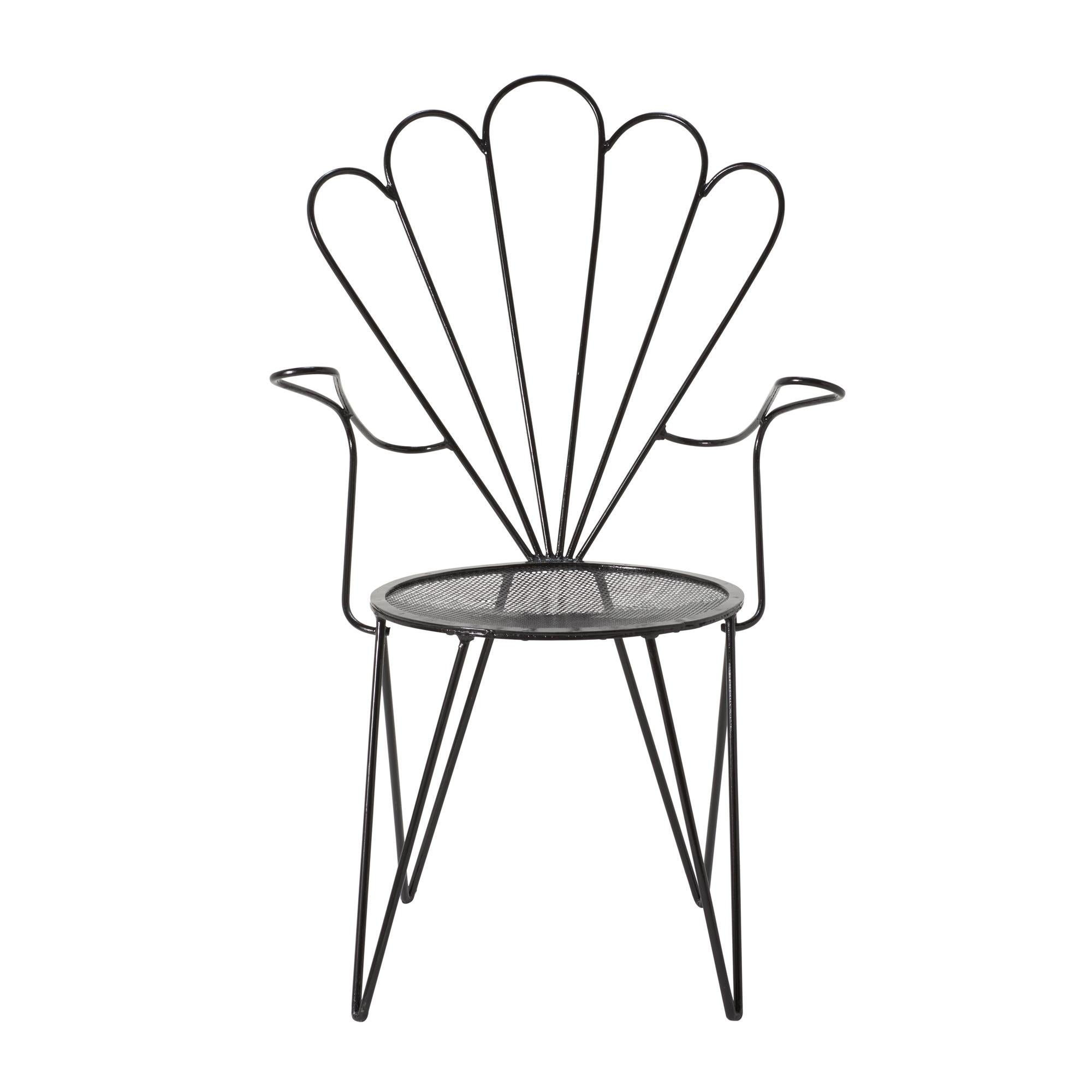 Set of 4 charming French iron garden chairs painted in black.

Since Schumacher was founded in 1889, our family-owned company has been synonymous with style, taste, and innovation. A passion for luxury and an unwavering commitment to beauty are