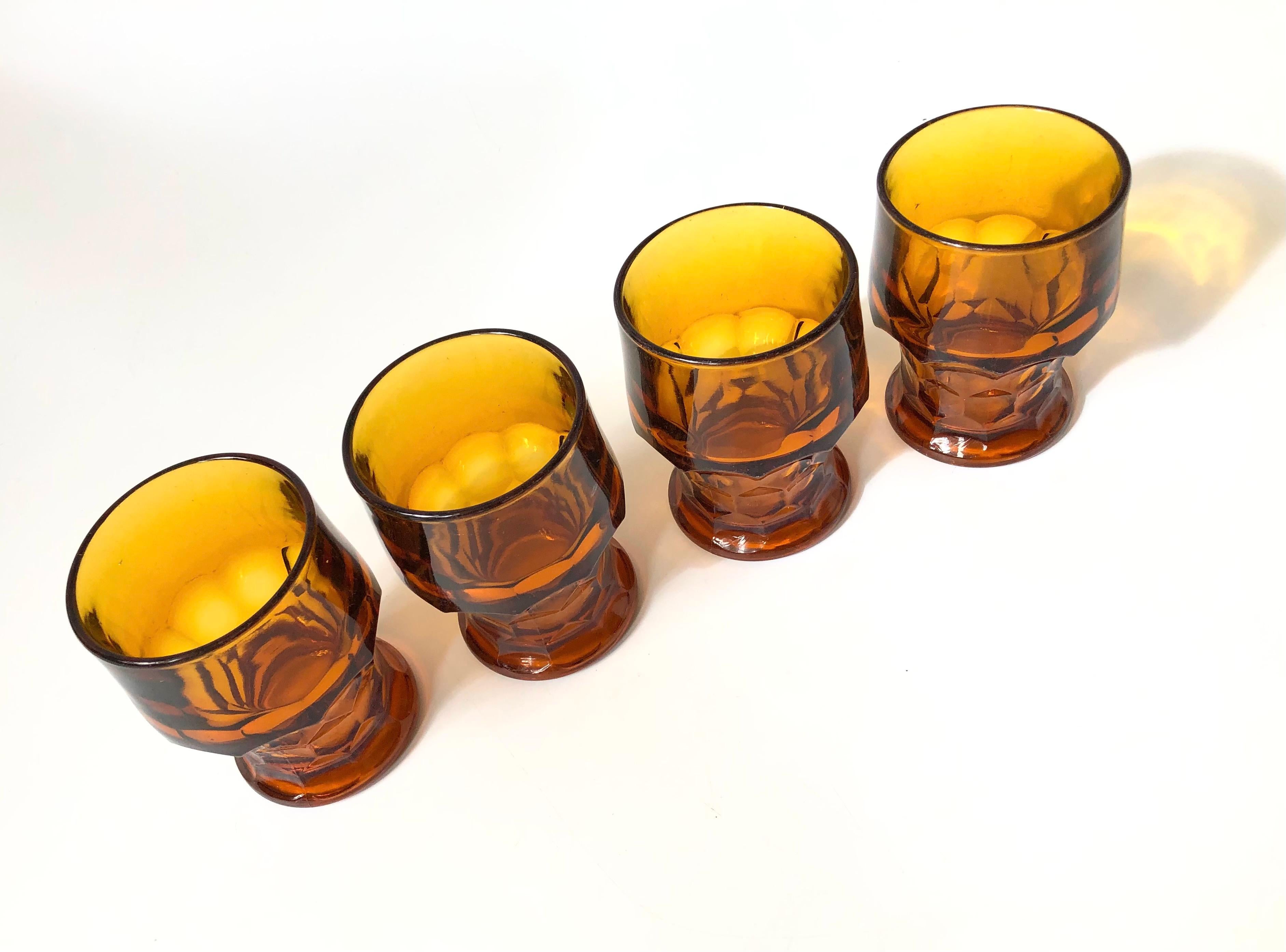 A set of 4 vintage amber cocktail glasses. Made in the 
