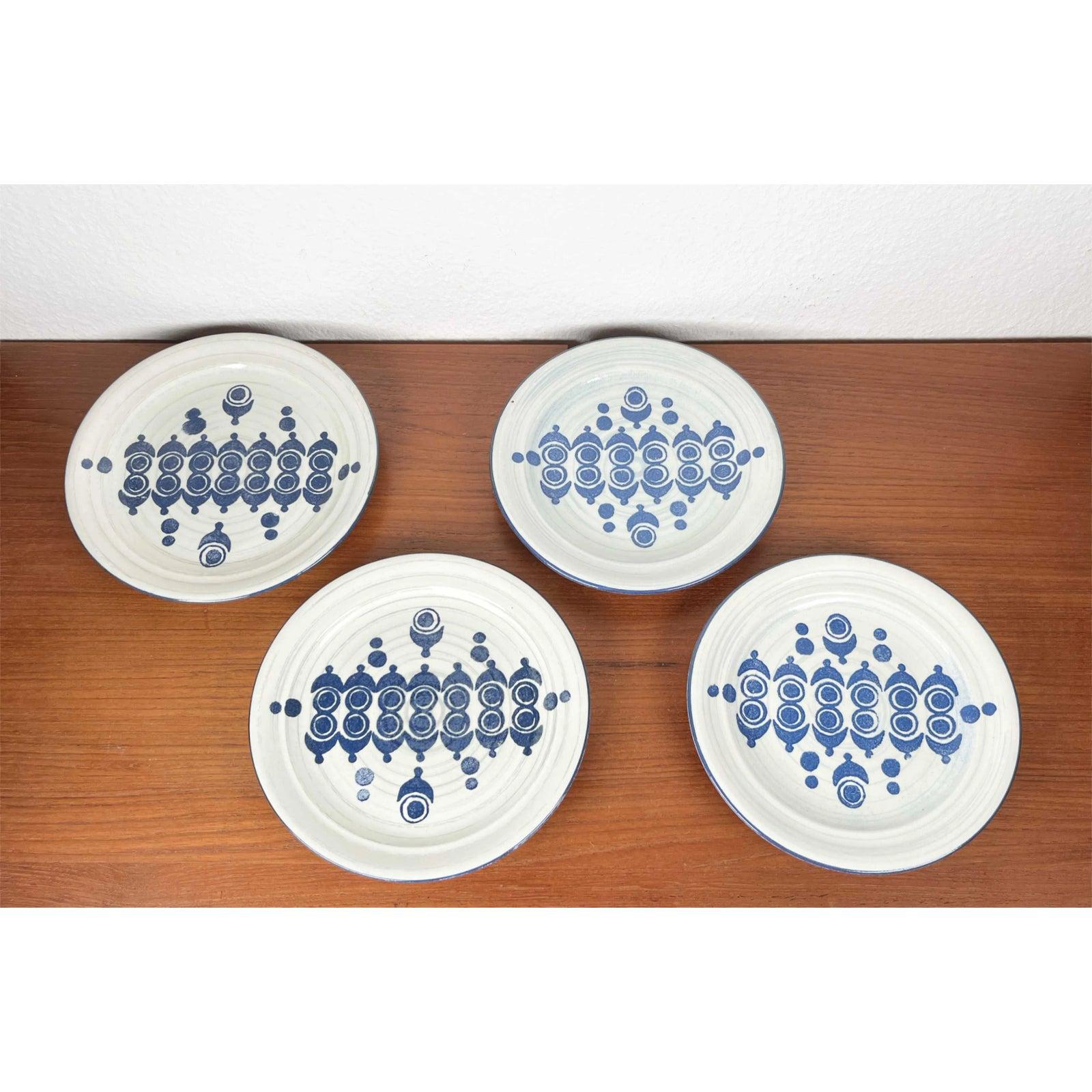 Mid-Century German Ceramic Plates from Ceramano, 1960s, Set of 4, in Very Good conditions. Designed 1960 to 1969 This piece has an attribution mark.

Additional information:
Materials: Ceramic
Color: Blue
Styles: Mid-Century Modern
Country of