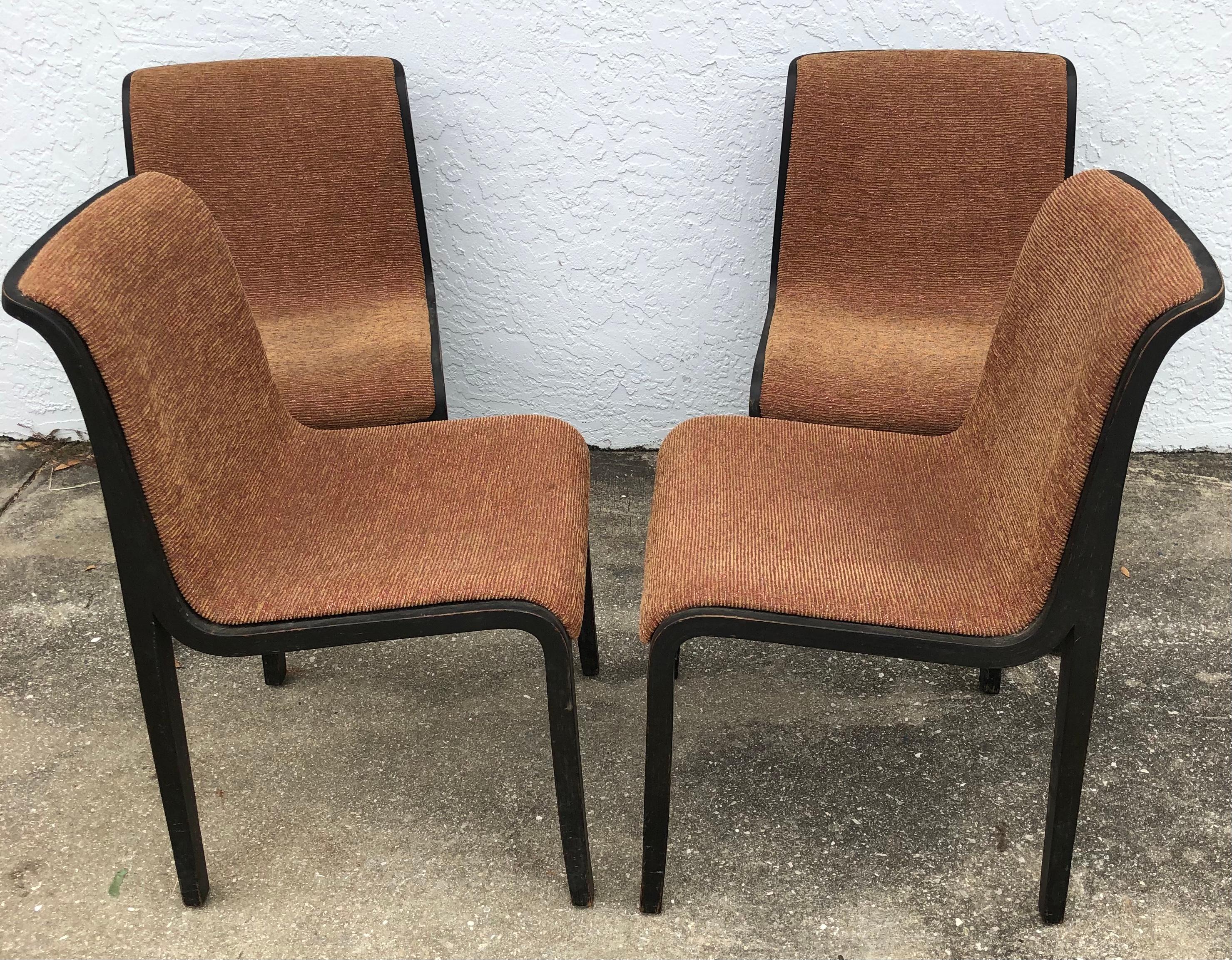 Set of 4 Mid-Century Modern Bill Stephens Knoll black walnut side chairs

Wonderful set of 4 vintage Mid-Century Modern Bill Stephens Knoll black walnut side chairs designed by Bill Stevens for Knoll. They are of bentwood appear to retain the
