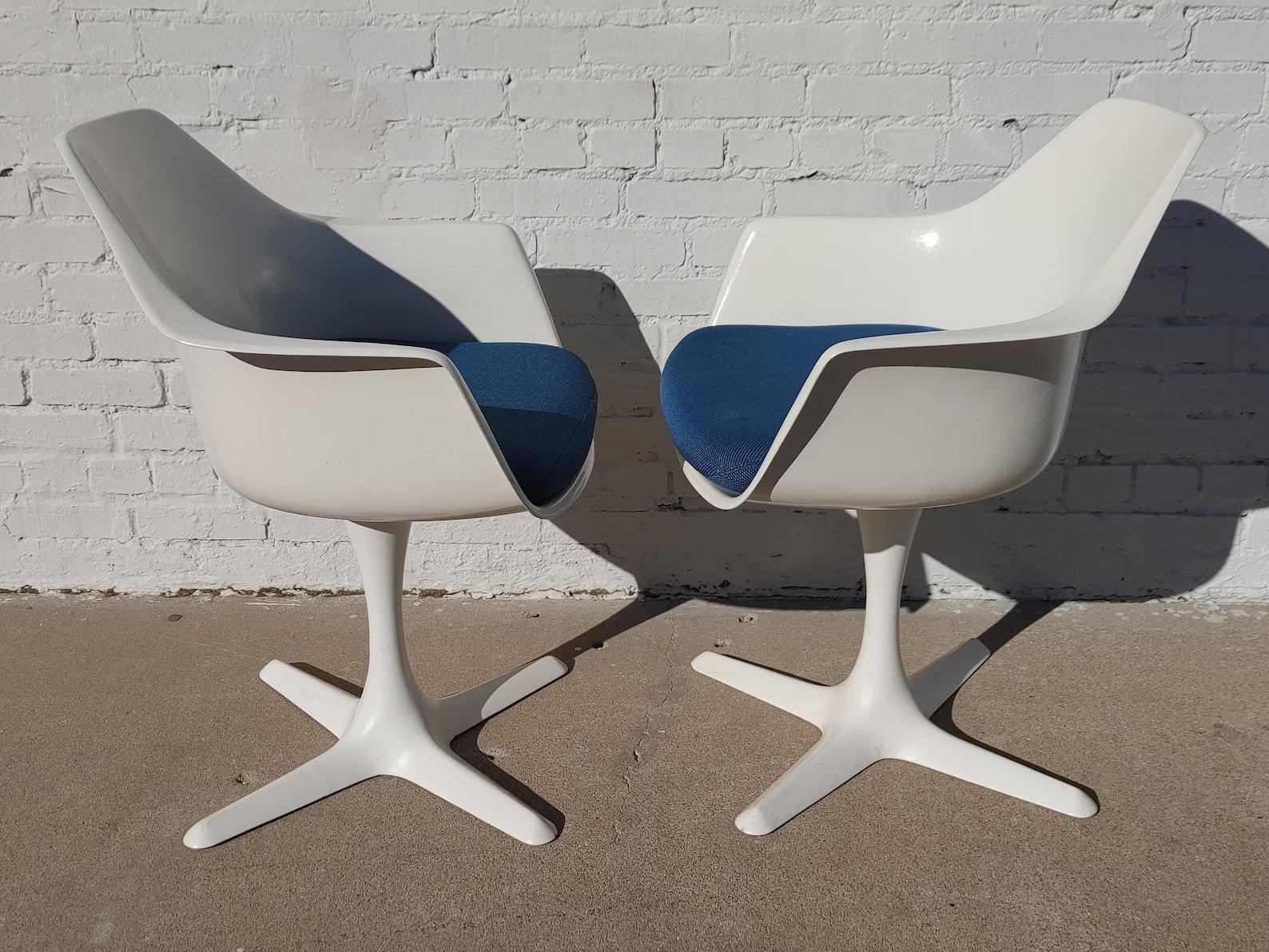 Set of 4 Mid Century Modern Burke Armed Tulip Chairs

Above average vintage condition and structurally sound. Has some expected slight finish wear, scratching, and very light seat soiling. Outdoor listing pictures might appear slightly darker or