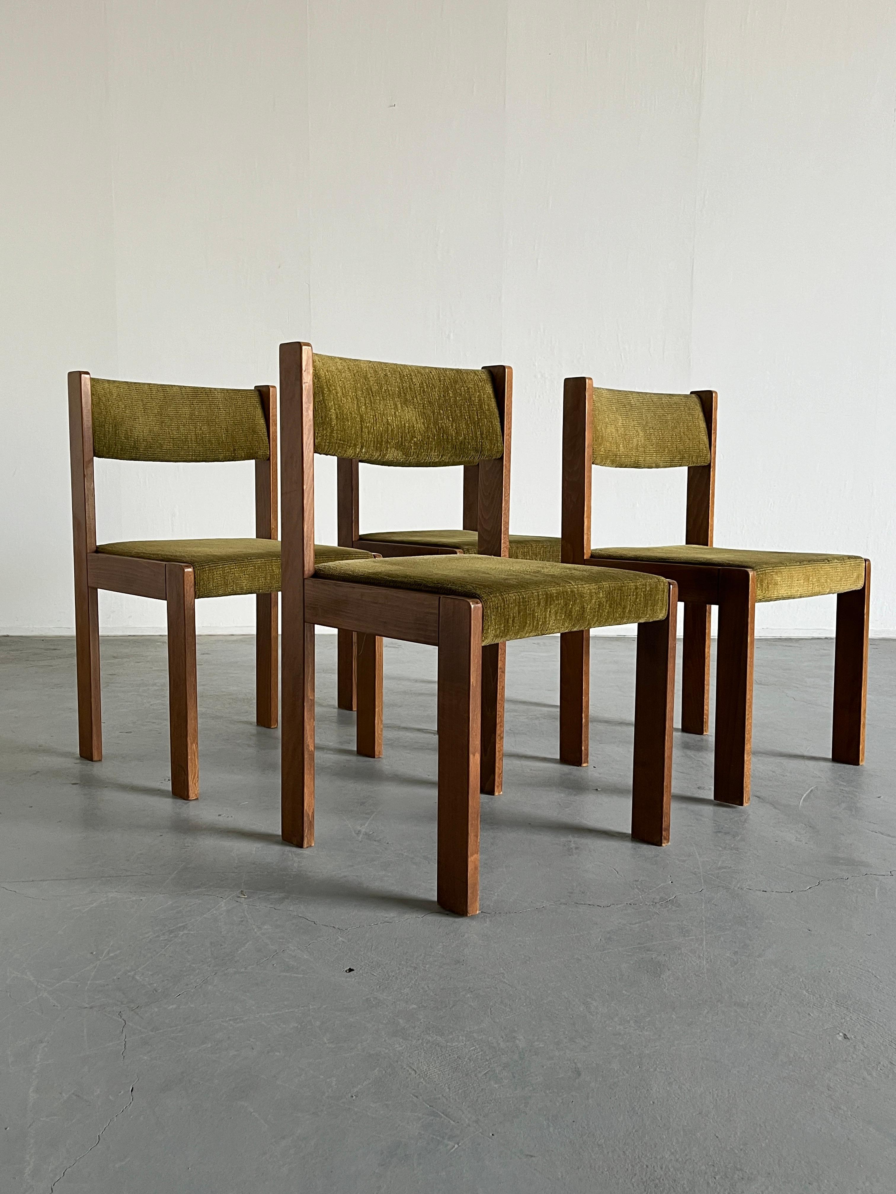 Beautiful and elegant Mid-century modern wood and mustard green upholstery dining chairs.

Produced by the iconic Austrian furniture manufacturer 'Wiesner Hager' during the 1960s, following the constructivist style of 'Monk' chairs by Tobia