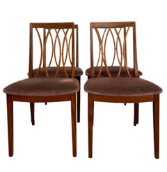 Satz von 4 Mid Century Modern Dining Chairs mit skulpturalem Rücken Design, UK Import