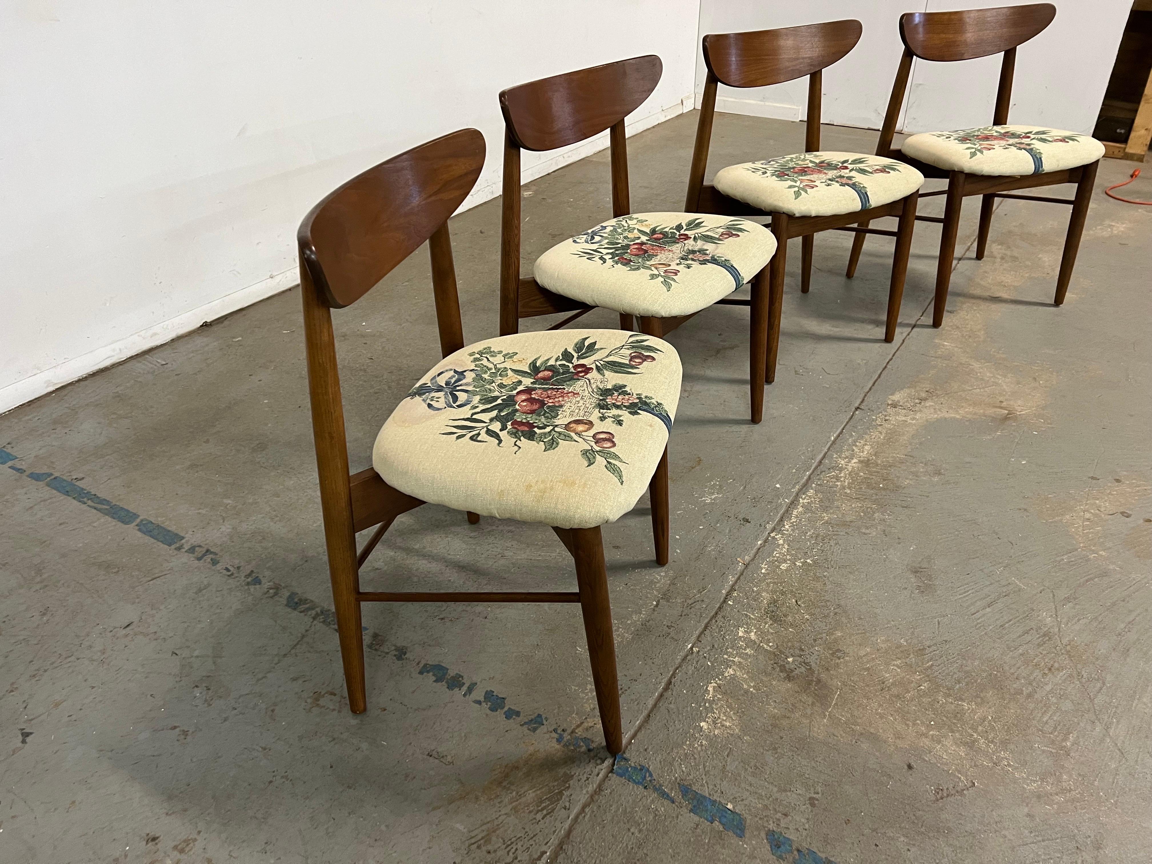 Set of 4 Mid-Century Modern H Paul Browning shell back walnut dining chairs

Offered is a vintage set of 4 Mid-Century Modern dining chairs attributed to H Paul Browning. These chairs have sleek lines and a lot of potential. Featuring curved shell