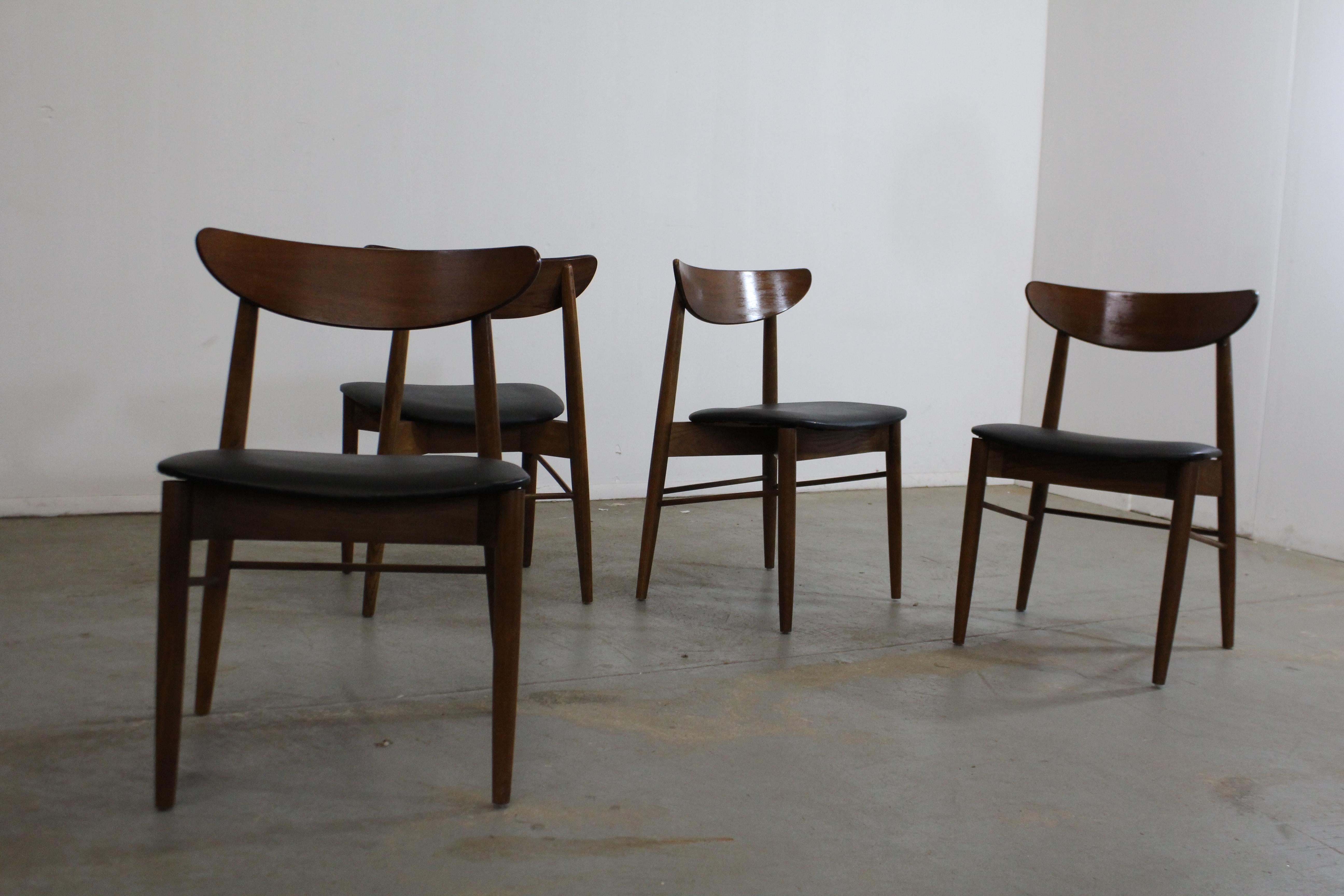 Set of 4 Mid-Century Modern H Paul Browning shell back walnut dining chairs

Offered is a vintage set of 4 Mid-Century Modern dining chairs by H Paul Browning. These chairs have sleek lines and have a lot of potential. Featuring shell back, walnut