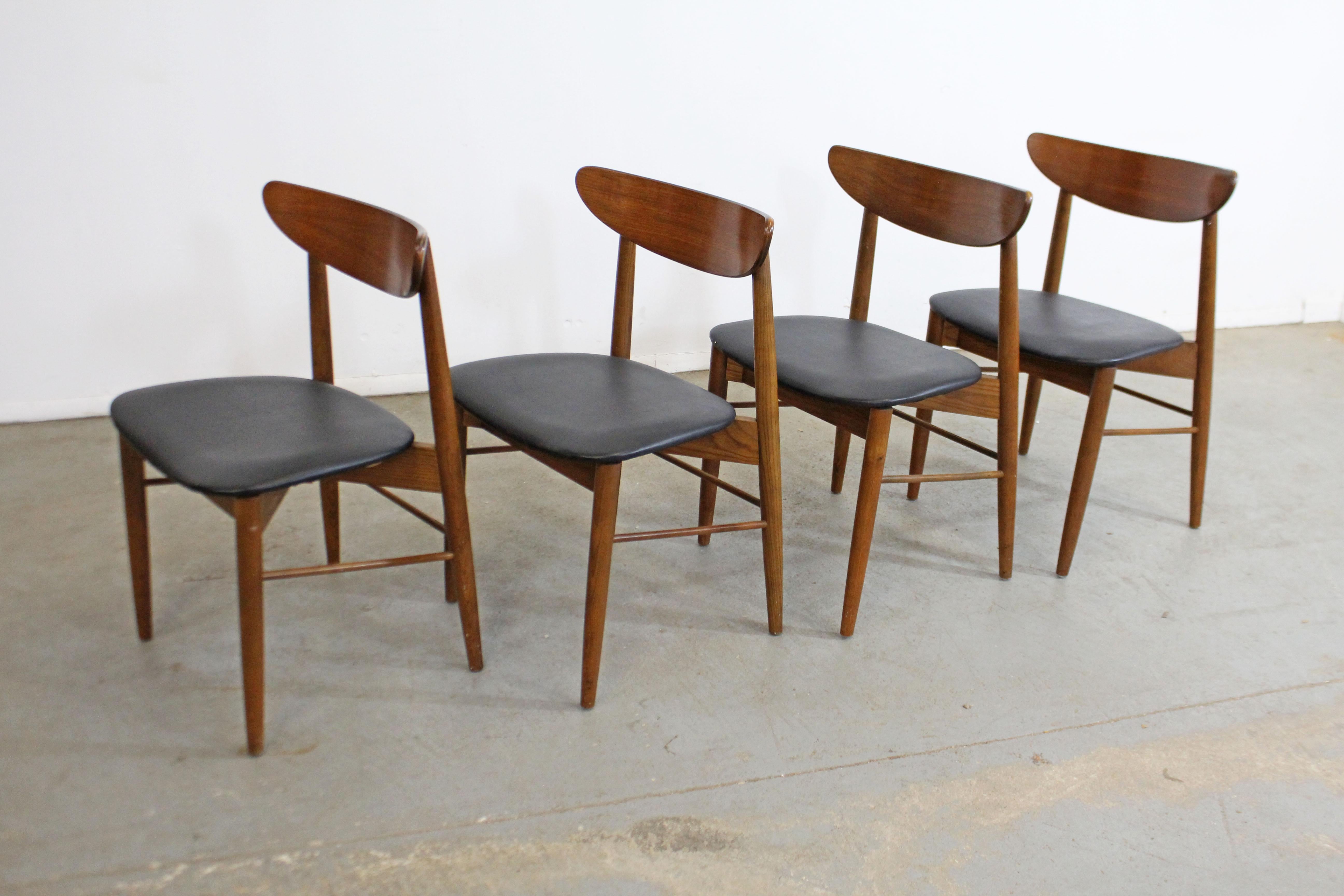 Set of 4 Mid-Century Modern H Paul Browning shell back walnut dining chairs

Offered is a vintage set of 4 Mid-Century Modern dining chairs attributed to H Paul Browning for Stanley. These chairs have sleek lines and a lot of potential. Featuring