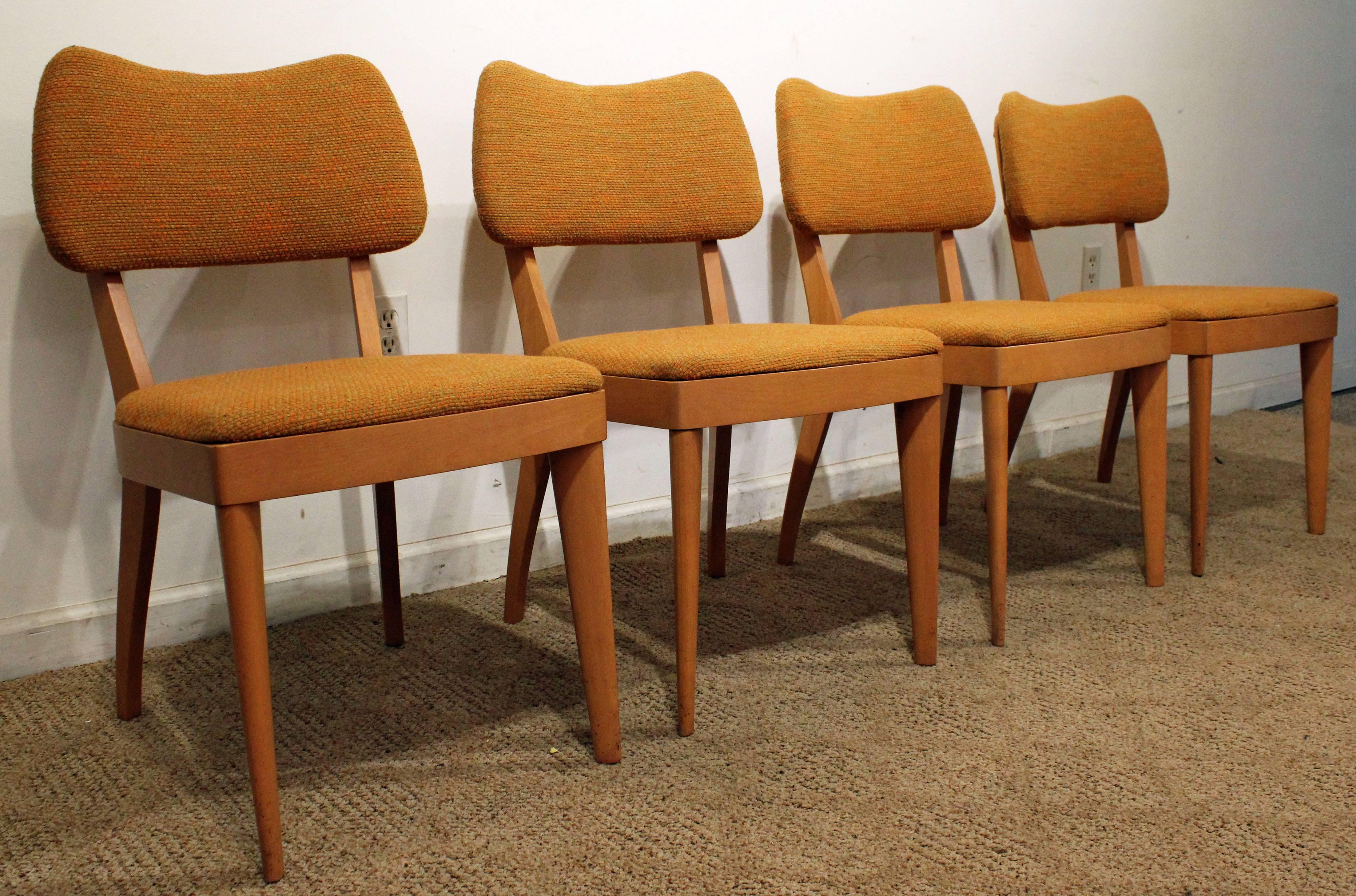 Offered is a set of 4 dining chairs, made by Heywood Wakefield. This set includes four side chairs made of birch with a champagne finish. In good condition and signed.

Approximate dimensions:
19.5