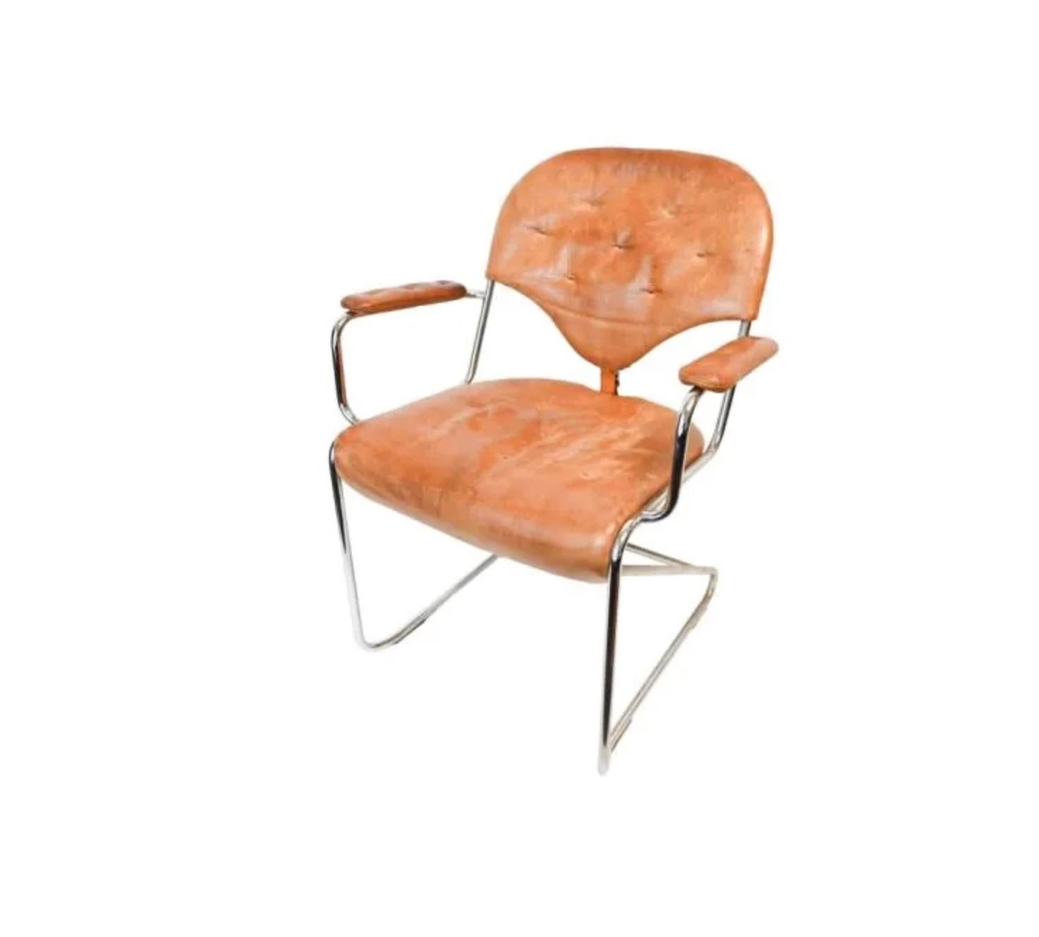 Rare Set of 4 Vintage Mid Century Modern leather and chrome designed by Sam Larsson for Dux of Sweden. Leather cushion and backrest with belt strap connecting them together on a bent chrome tube steel frame. The set has all matching chairs with the