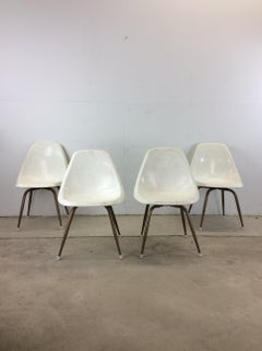 Set of 4 Mid Century Modern Molded Plastic Chairs with Swivel Base