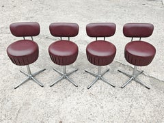 Set of 4 Mid Century Modern Swivel Chairs in tubular steel and leather