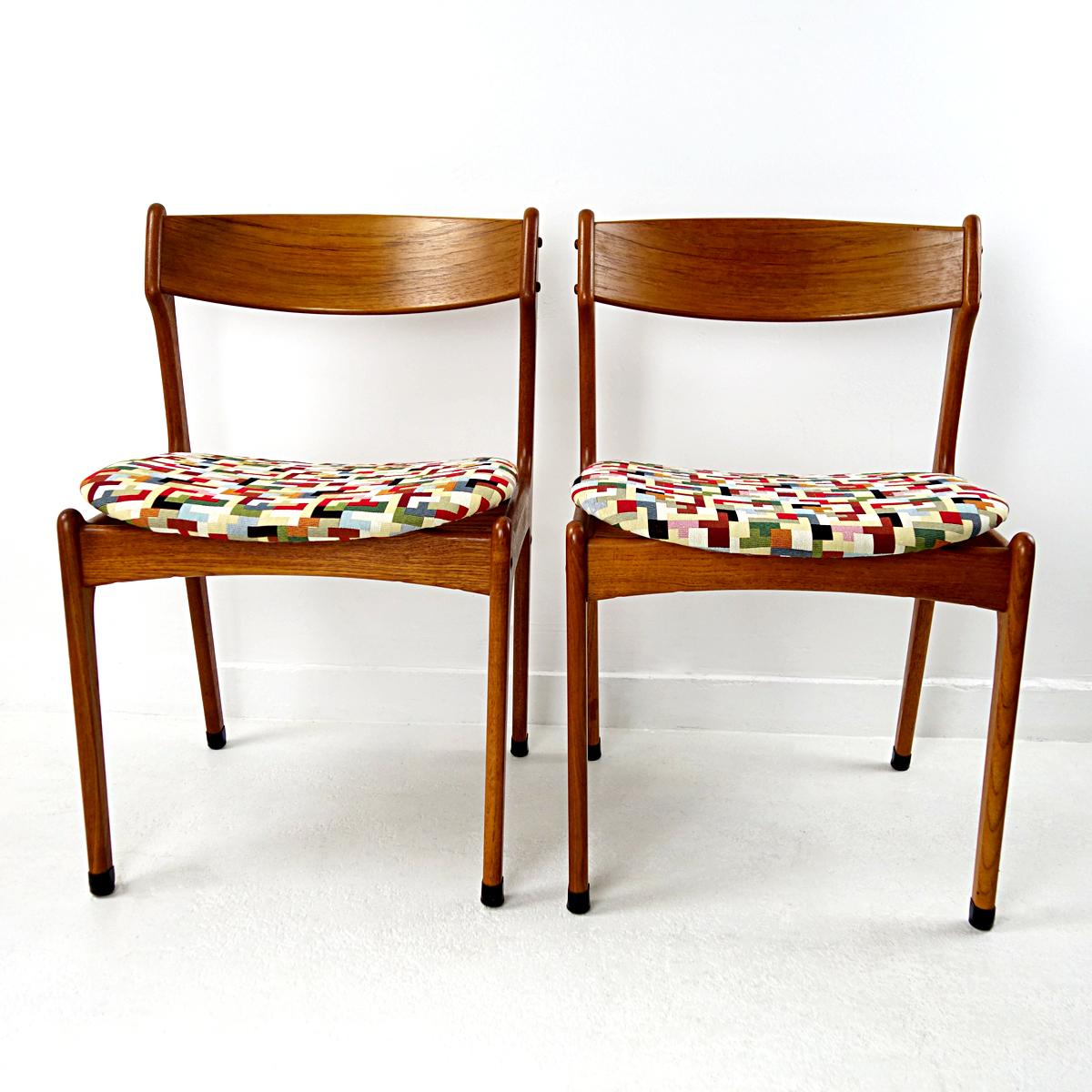 These very elegantly designed dining chairs are made of teak wood. They have some eye-catching details such as the visually floating seats, the protective feet covers and the visual wood connections.
They have been reupholstered with a colorful yet