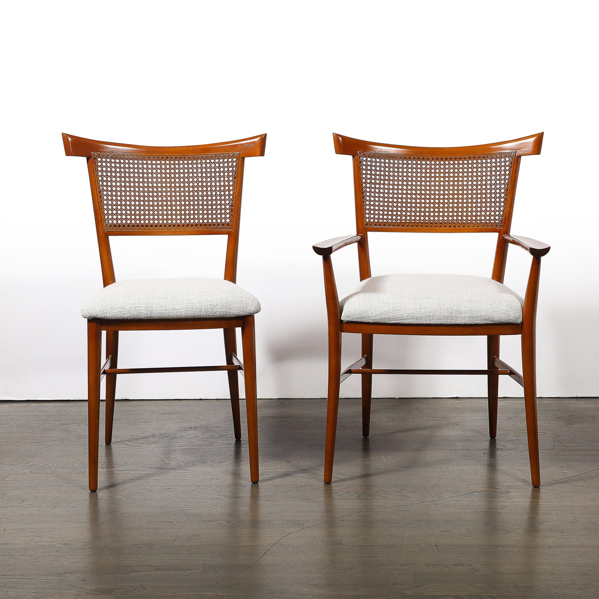 Progettato dall'iconico designer moderno di metà secolo Paul McCobb, questo set di quattro sedie da pranzo della collezione 