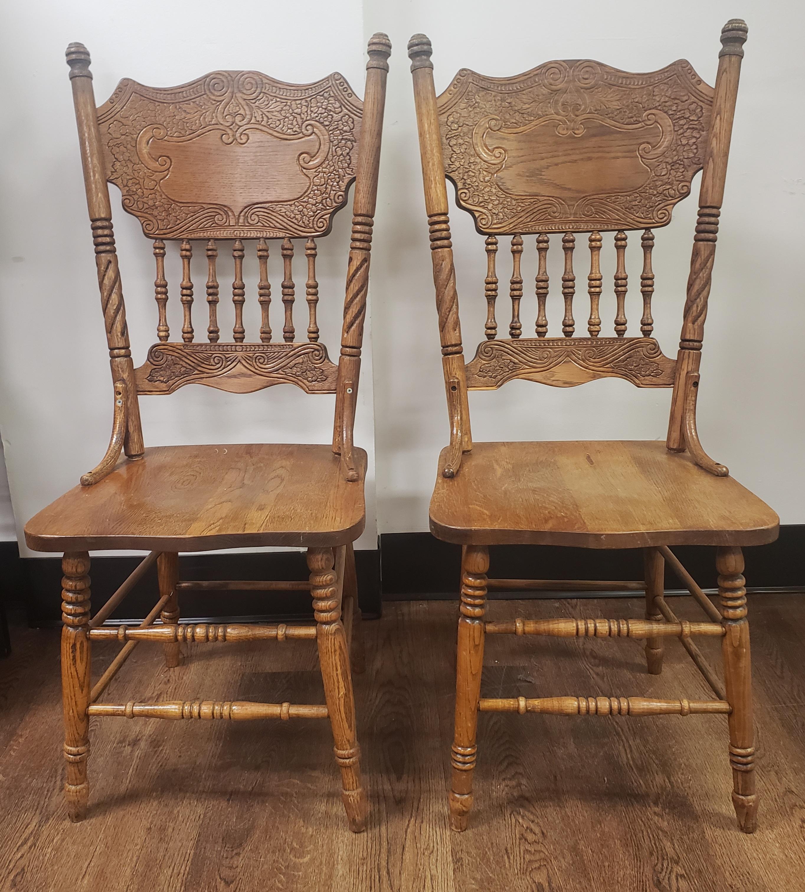 Set of 4 midcentury pressback Spindle Oak Country dining chairs. High backs. 
Measures 18