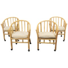 Set of 4 Midcentury Rattan Dining Chairs with Rollers