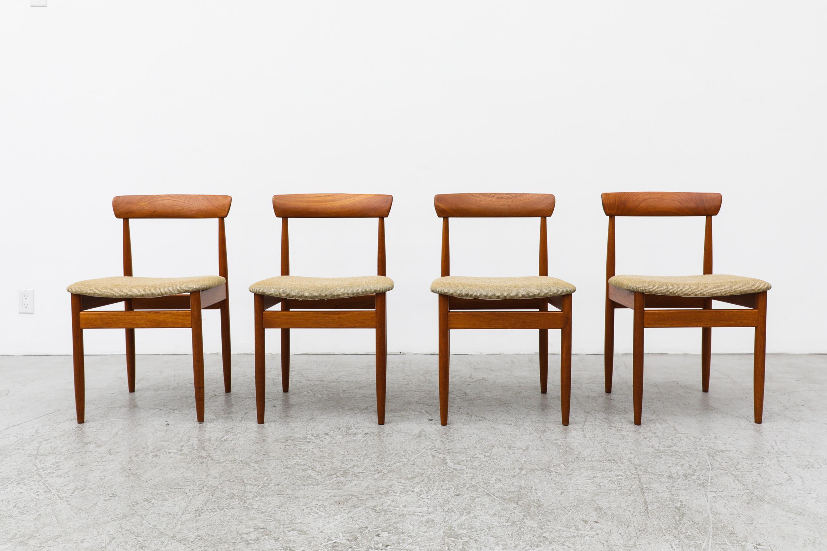Set of 4 Mid-Century teak side chairs with thin carved teak backrests and newer beige upholstered seats by German manufacturer Inter Lübke. In original condition with some minor scratches and wear, consistent with their age and use.