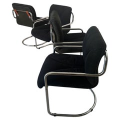 Set of 4 mid-century tubular armchairs by Guido Faleschini for Hermès