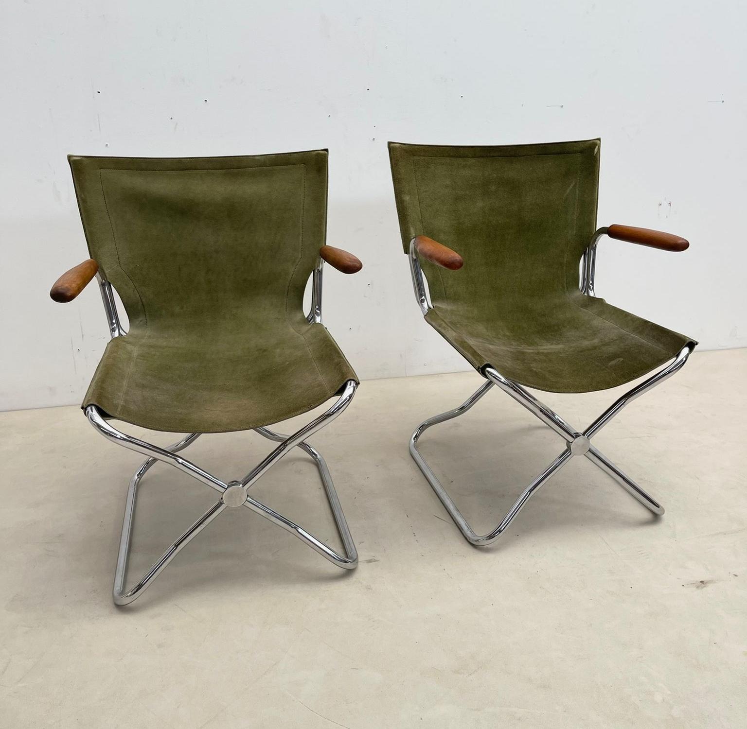 Set of 4 mid-century wood metal and green canvas folding armchairs.