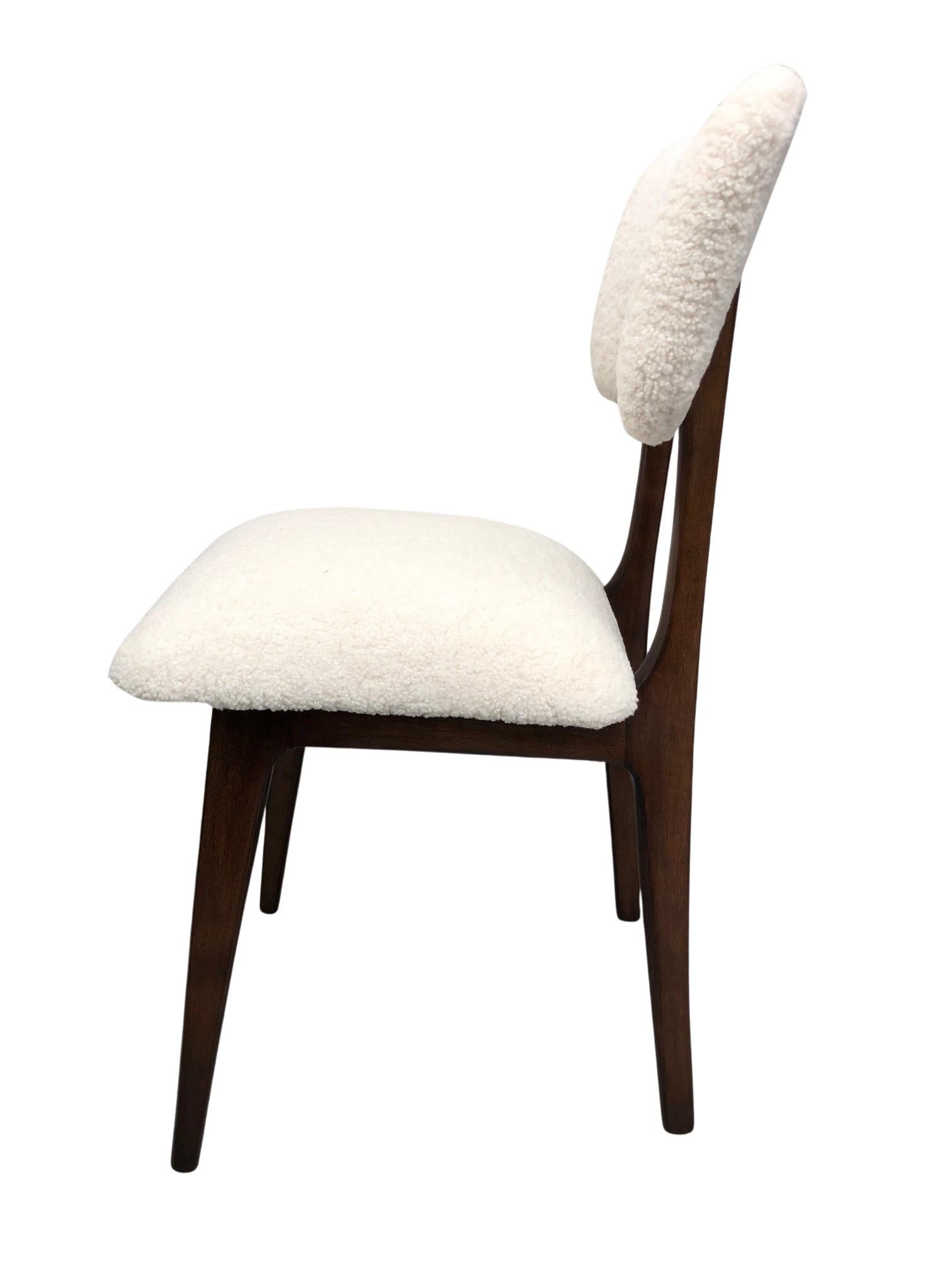 Unique set of four chairs manufactured in Poland in the 1960s, designed by Rajmund Halas. 

The upholstery is made of pleasant to touch boucle textile. It is high quality and durable italian fabric in a warm taupe (light grey light beige) color.