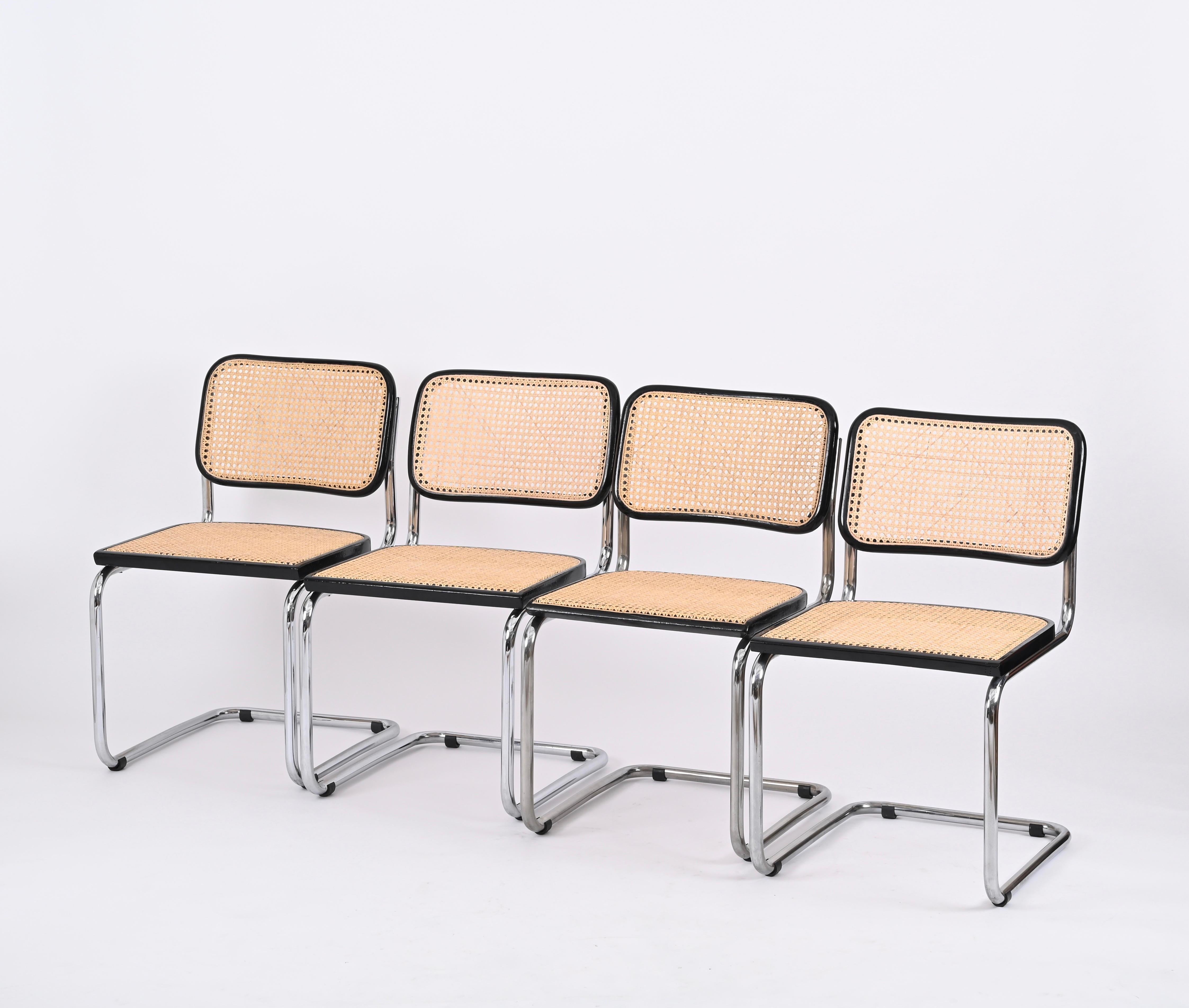 Beautiful set of four Mid-Century chromed metal and rattan chairs 