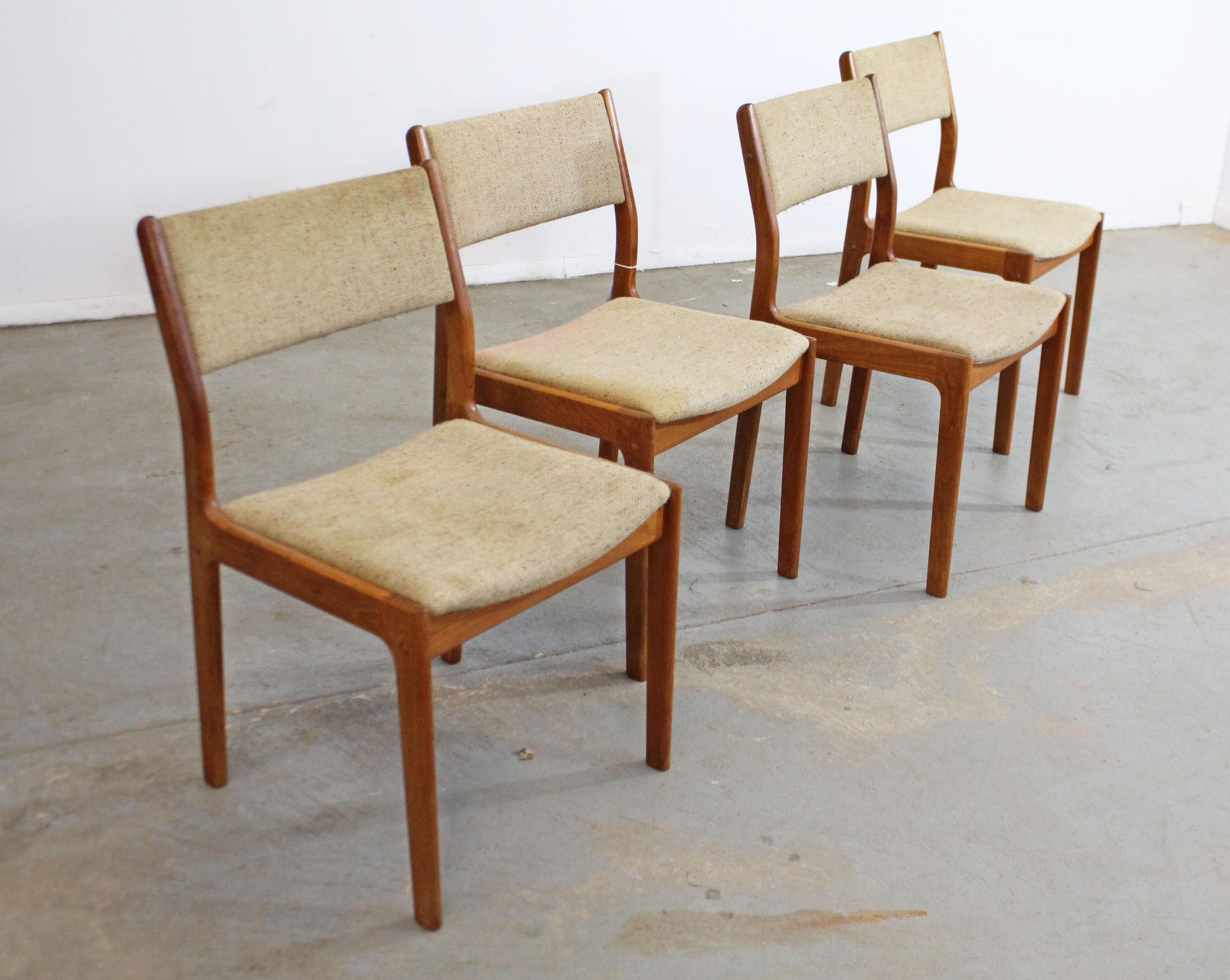 What a find. Offered is a vintage set of 4 teak side/dining chairs. This set has simple, but modern lines and could make an excellent addition to any home. They are in decent vintage condition, but can stand to be reupholstered. Has surface
