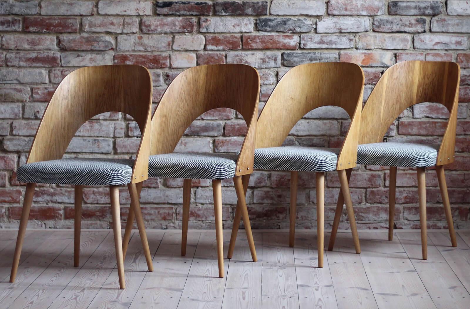 This set of four vintage dining chairs was designed by Czech designer Antonin Šuman in the 1960s. Produced by Drevopodnik Pisek. The chairs have been completely restored finished with high-quality oil that gave them beautiful finish and refreshed