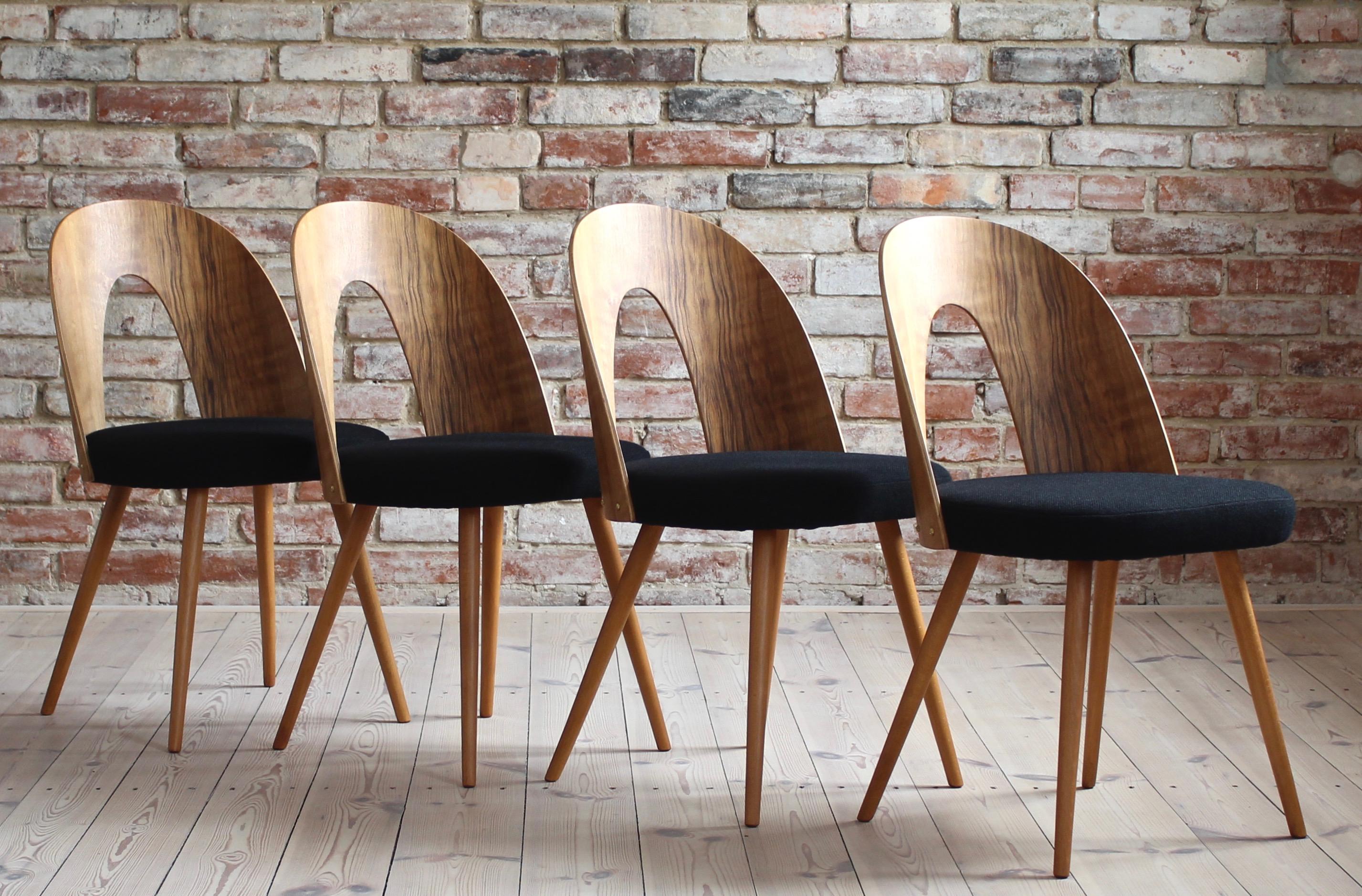 This set of four vintage dining chairs was designed by Czech designer Antonin Šuman in the 1960s. Produced by Mier Topolcany. The chairs have been completely restored finished with natural oil that gave it a natural and warm look. The set is
