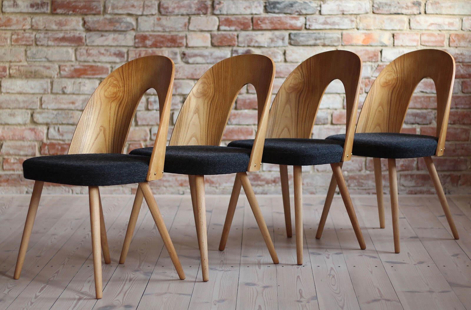 This set of four vintage dining chairs was designed by Czech designer Antonin Šuman in the 1960s. Produced by Tatra Nabytek. The chairs have been completely restored finished with natural oil that gave them natural and warm look. The set is