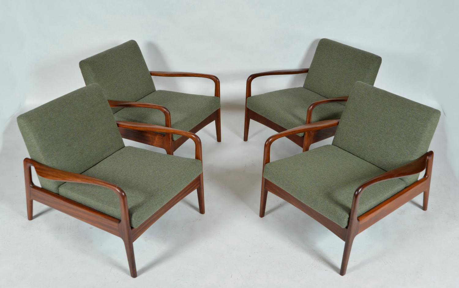 An incredibly stylish, rare set of four 1960s Midcentury Modern low back teak lounge chairs by British company Greaves & Thomas. The chairs have a great stance, and are comfortable to sit in. The beautifully sculptured curved arms are extremely